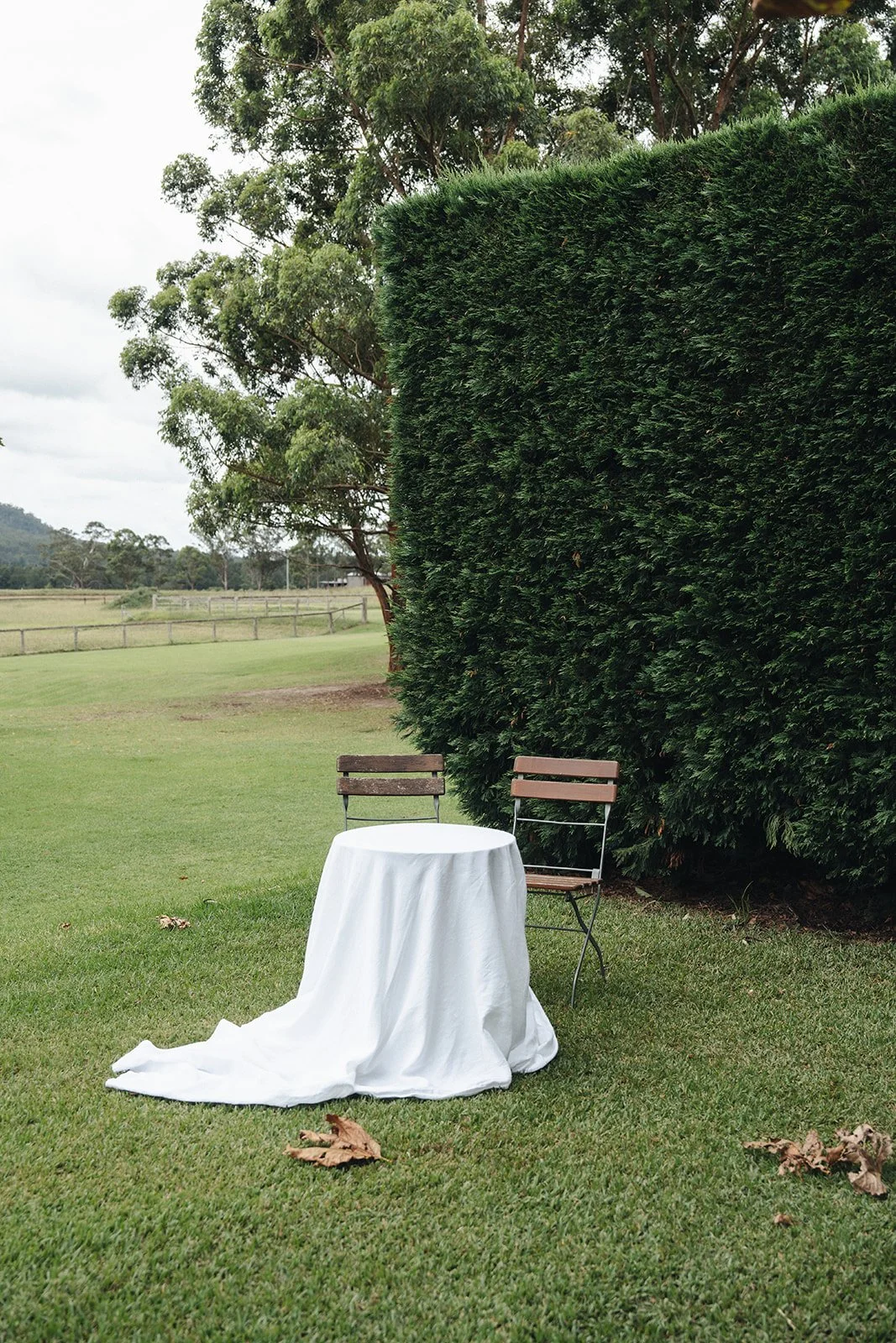 The registry signing table set in the gardens at Krinklewood Estate.