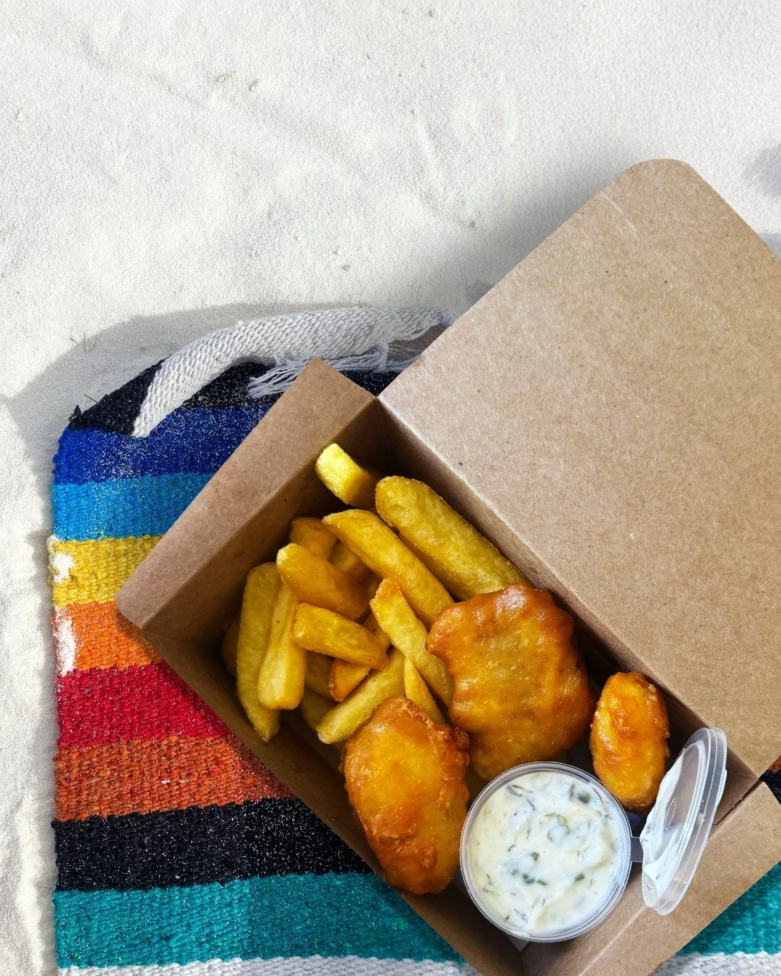 Starting 2026 the right way with sun, sand, and a BW Fish &amp; Chips Meal Box to fuel the adventure. 🐟 🌞