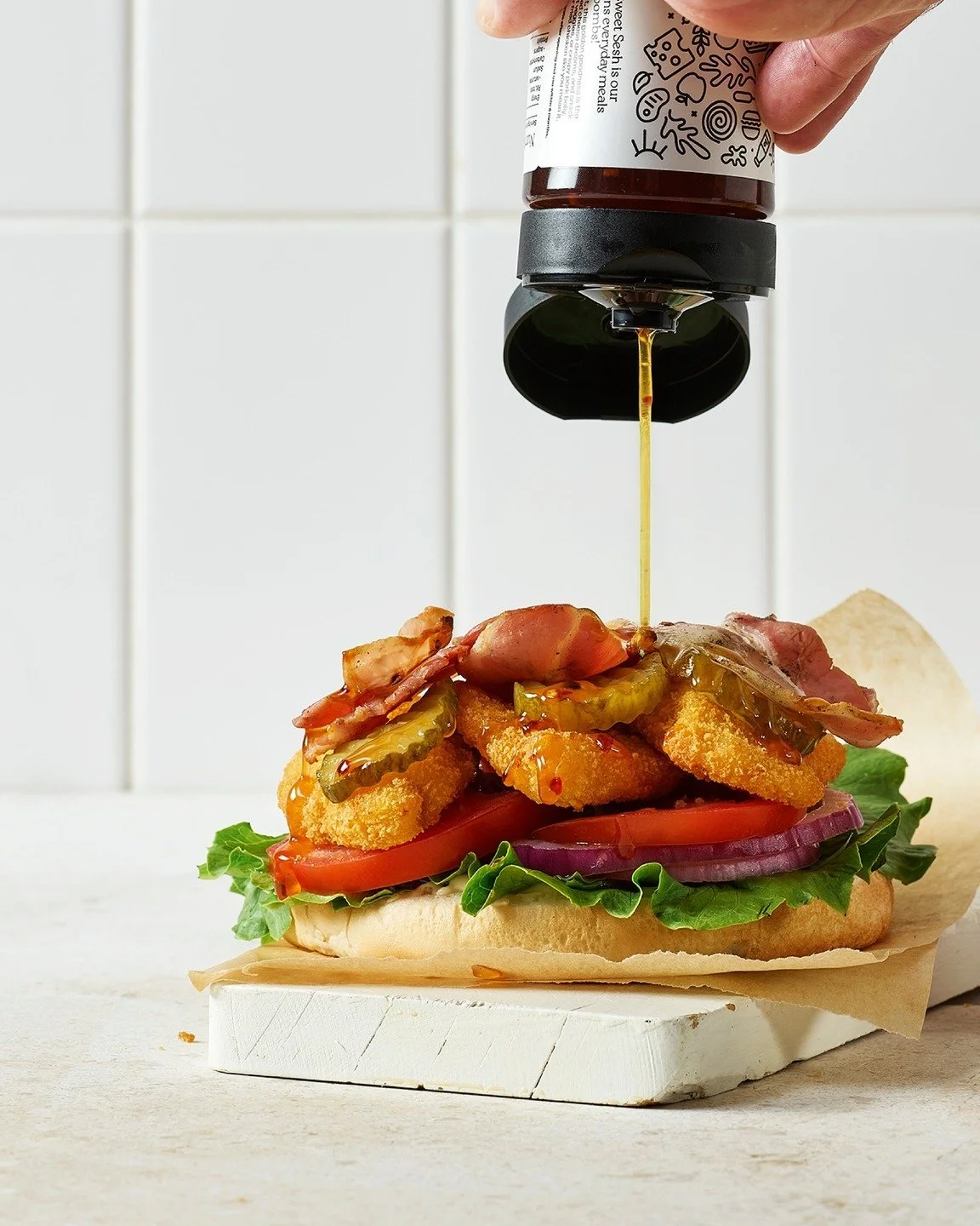 Have you tried the Sticky Chicky yet? Pepper &amp; Me hot honey drizzled over crumbed chicken and crispy bacon, with McClure's sweet &amp; spicy pickles, fresh salad and mayo on a sesame seed bun. 🌶️ 🍯