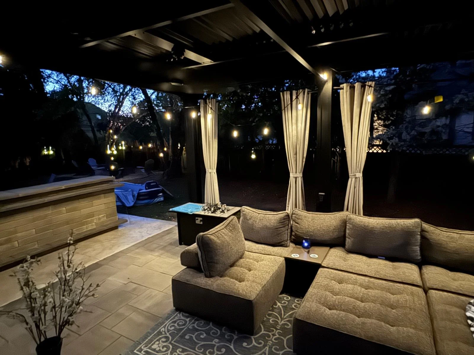 An outdoor space at home post installing Solara Pergola Covers