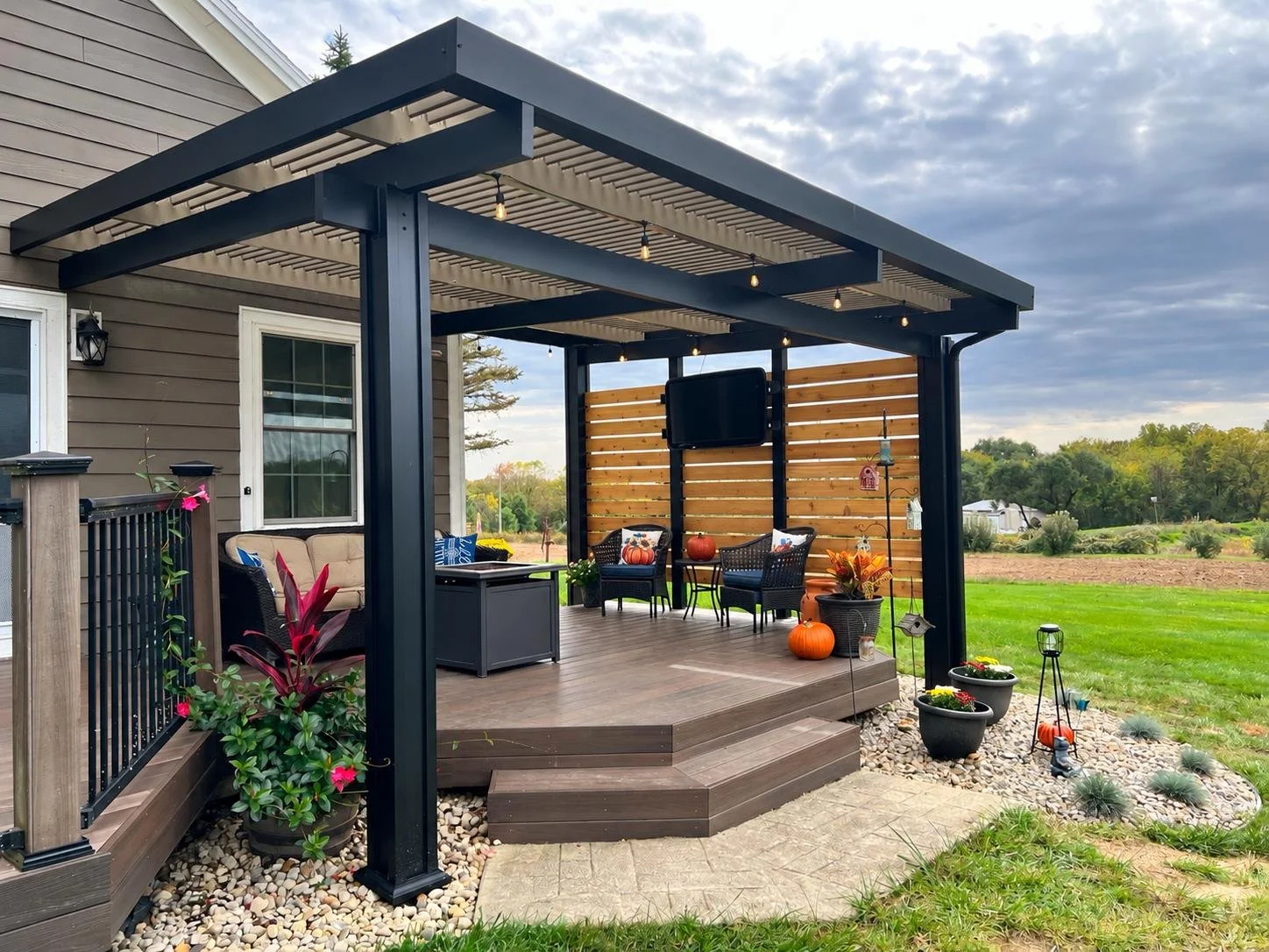 An outdoor space near a pool after installing Solara Patio Covers