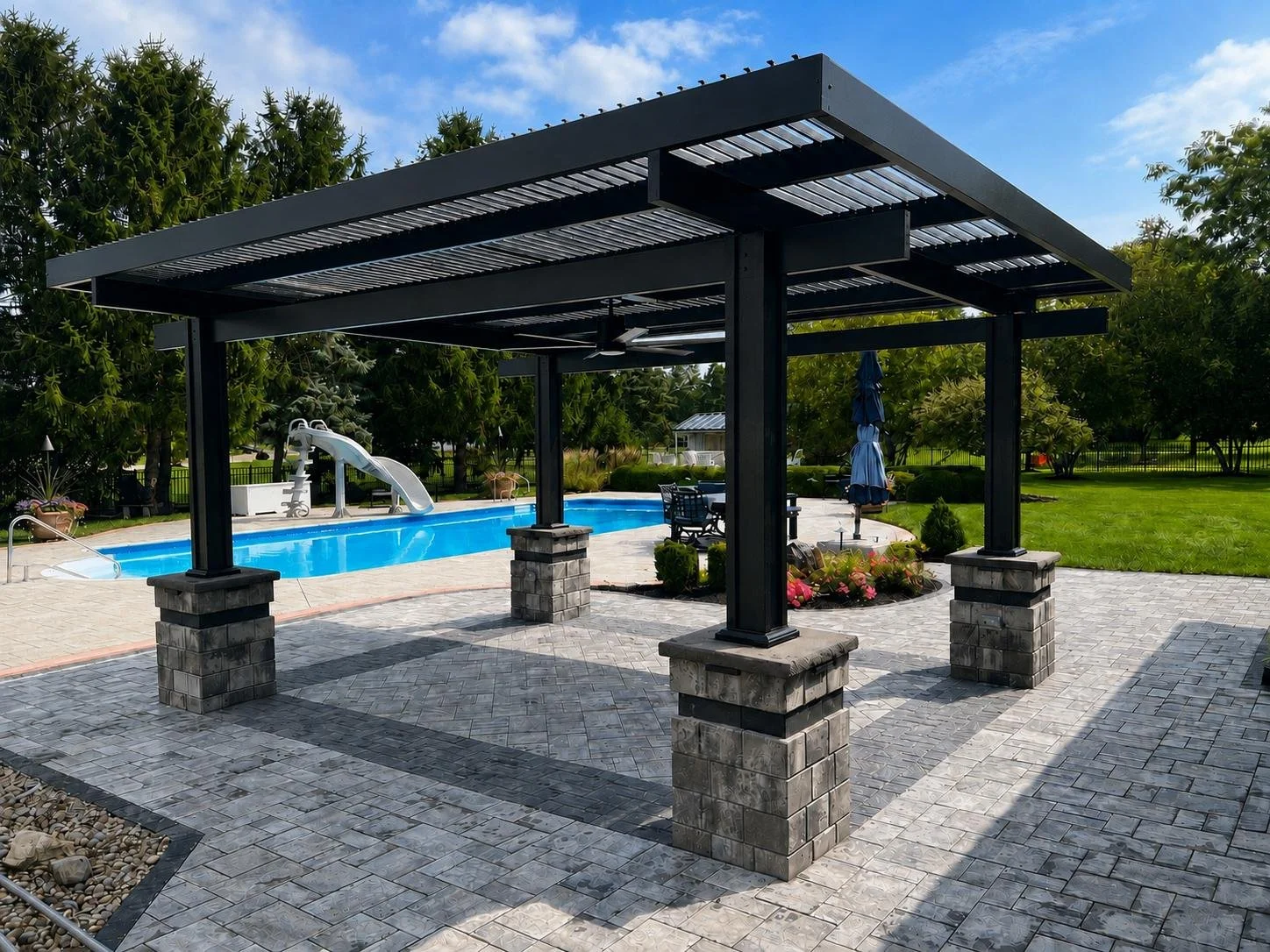 An outdoor space near a pool after installing Solara Patio Covers