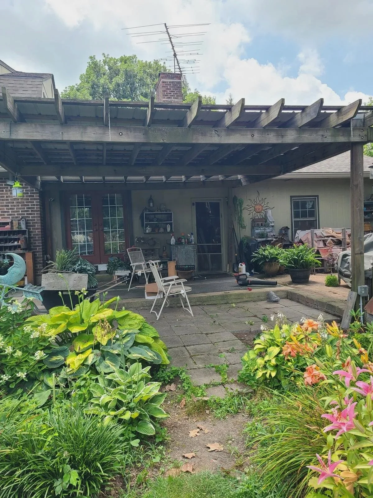 Backyard patio area behind a residential home before installation of a Solara patio cover