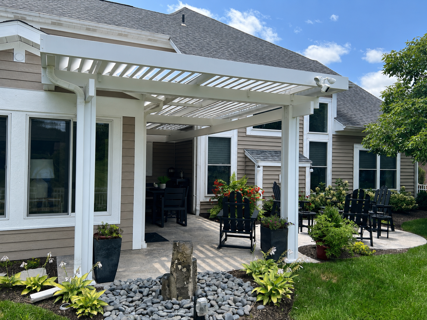 An outdoor space at home after installing Solara Patio Covers