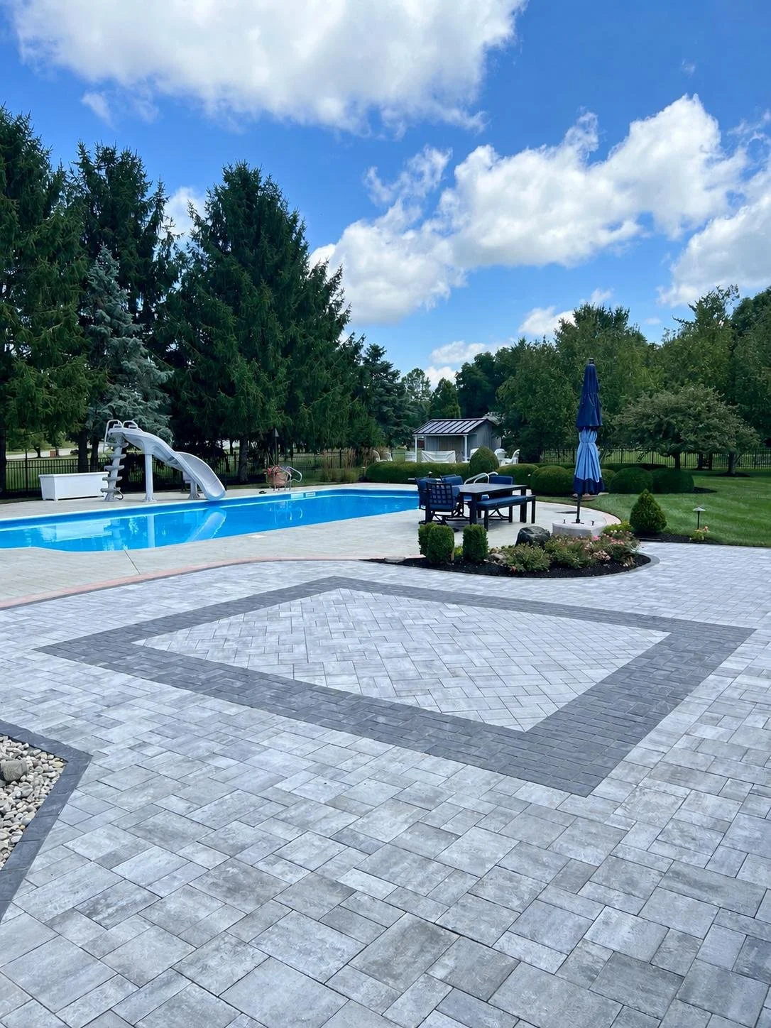 Backyard patio area behind a residential home before installation of a Solara patio cover