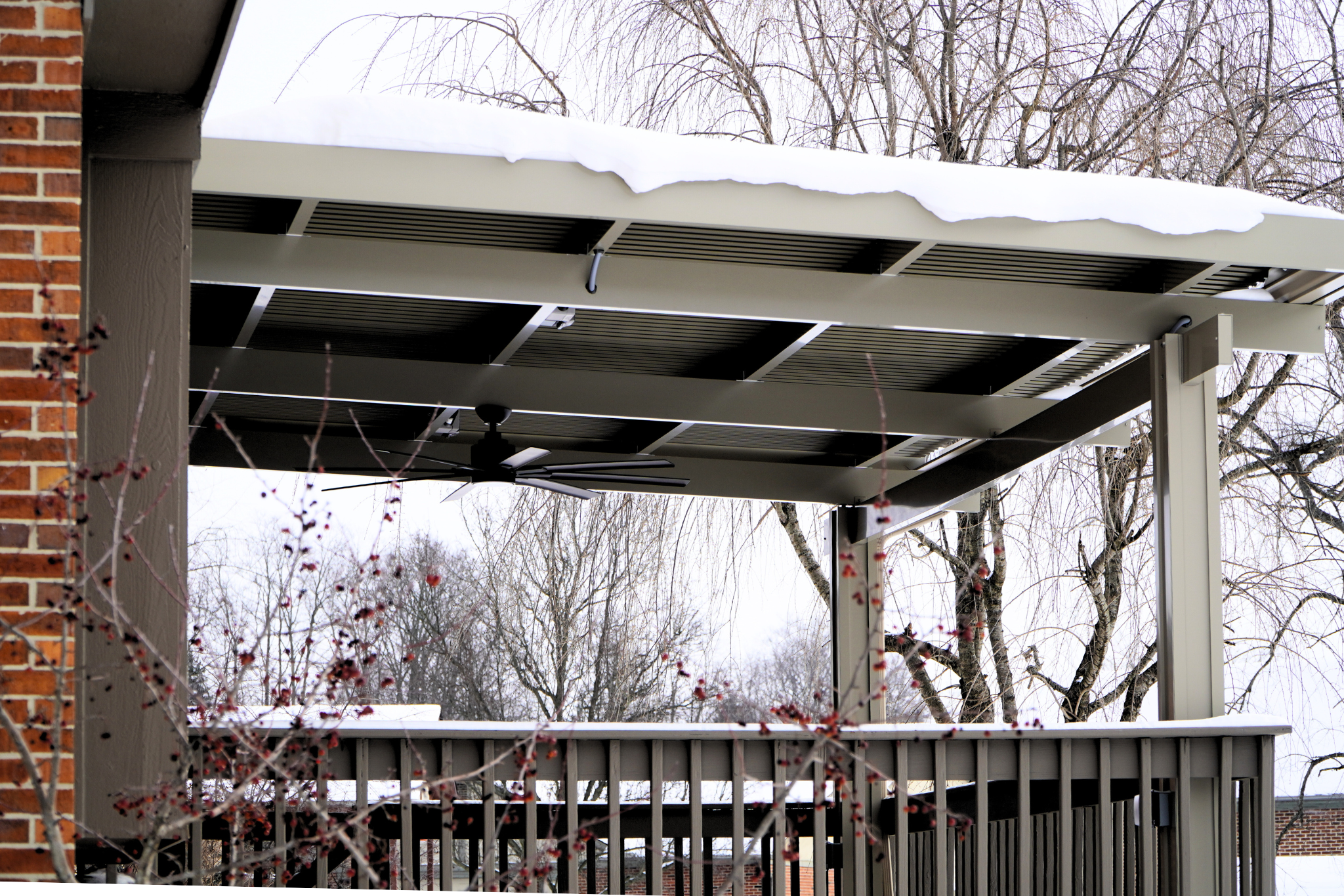 Patio Covers Ohio - Heavy snow sitting on a Solara aluminum patio cover, showing how it holds up during Ohio winters without sagging or damage.