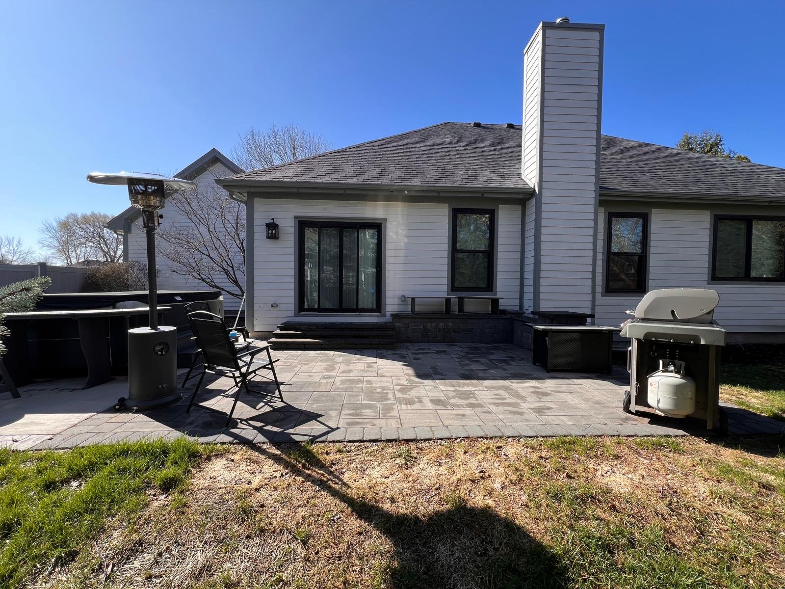 An outdoor space at a home before installing Solara Pergola Cover