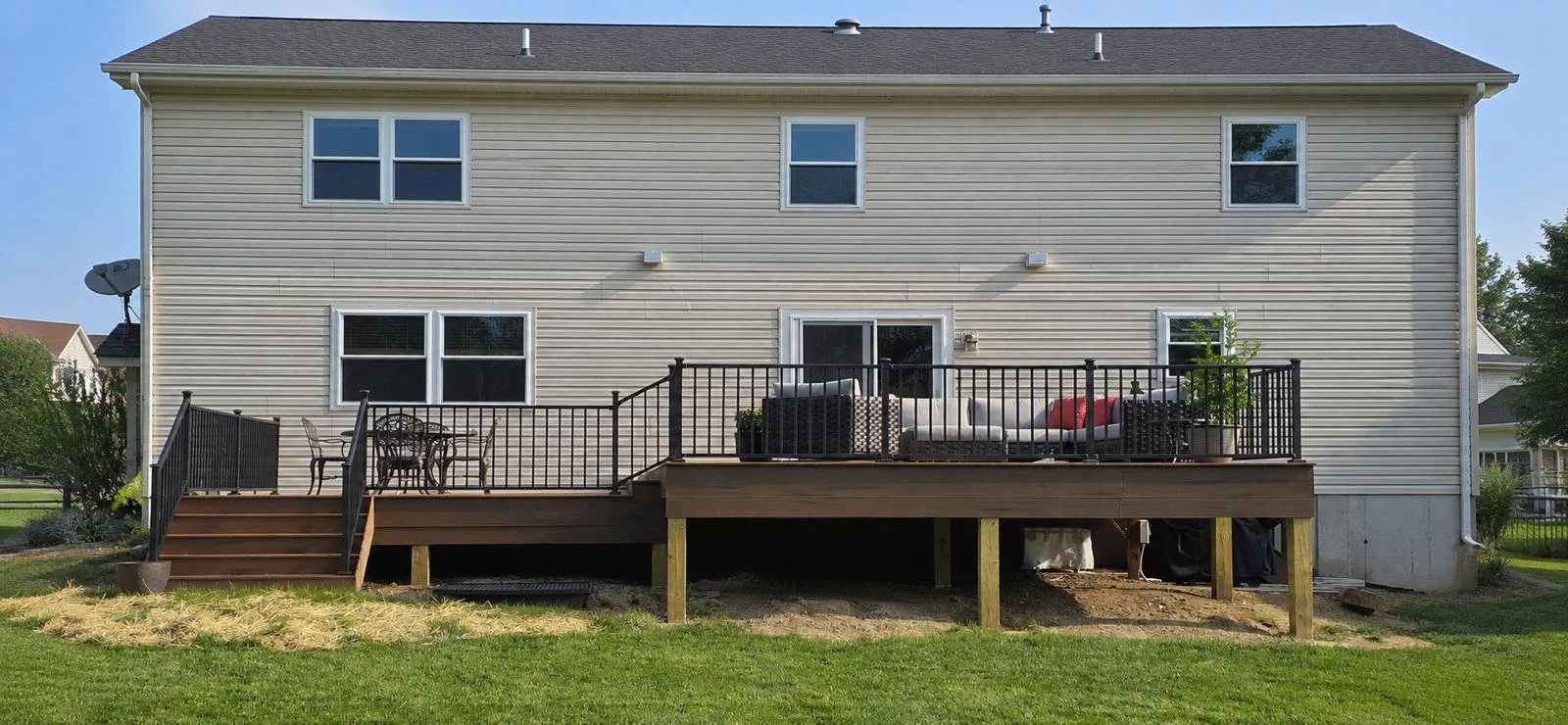 Backyard patio area behind a residential home before installation of a Solara patio cover