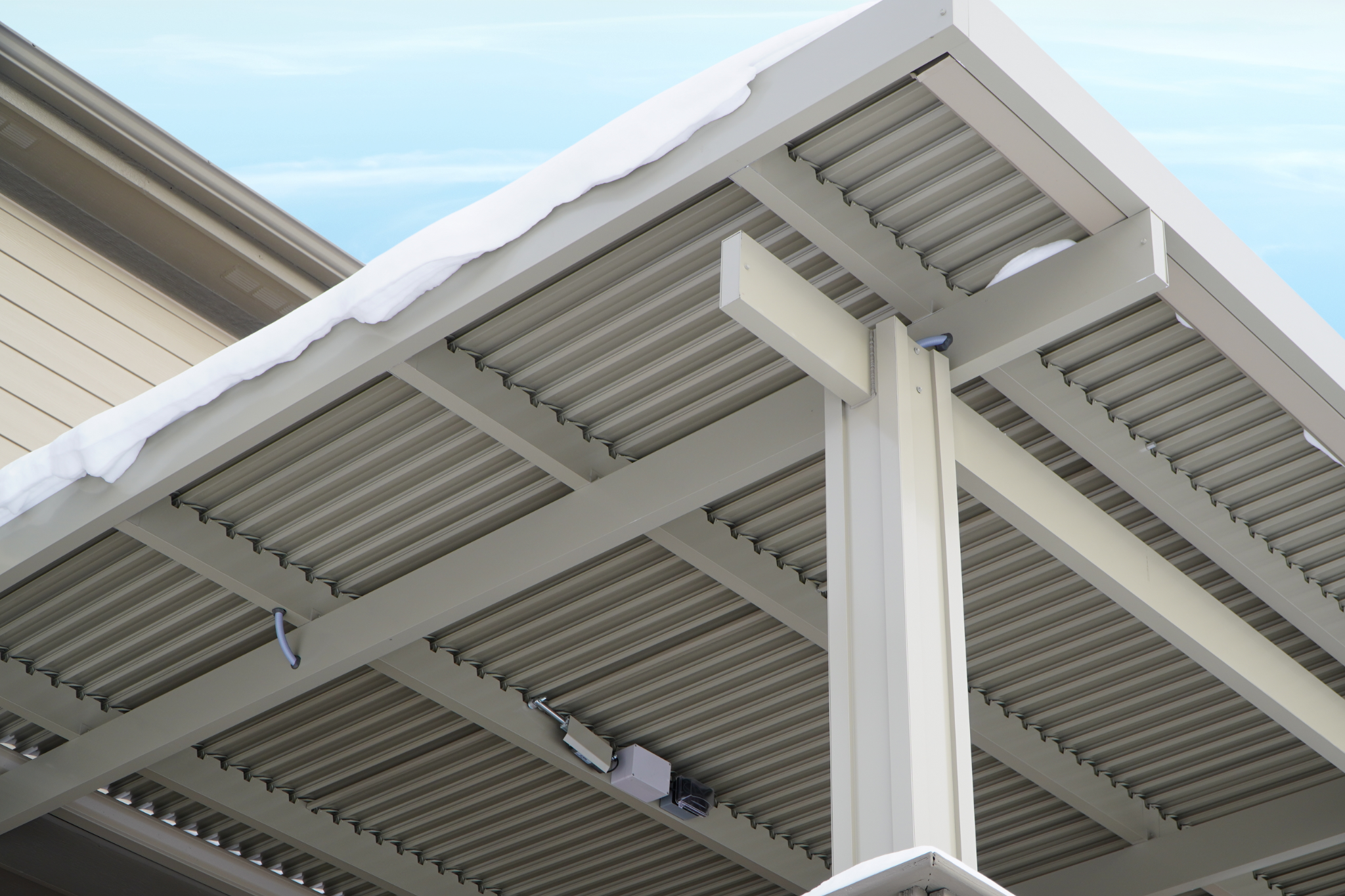 Patio Covers Ohio - Close-up view showing reinforced aluminum beams supporting snow load without bending or cracking.