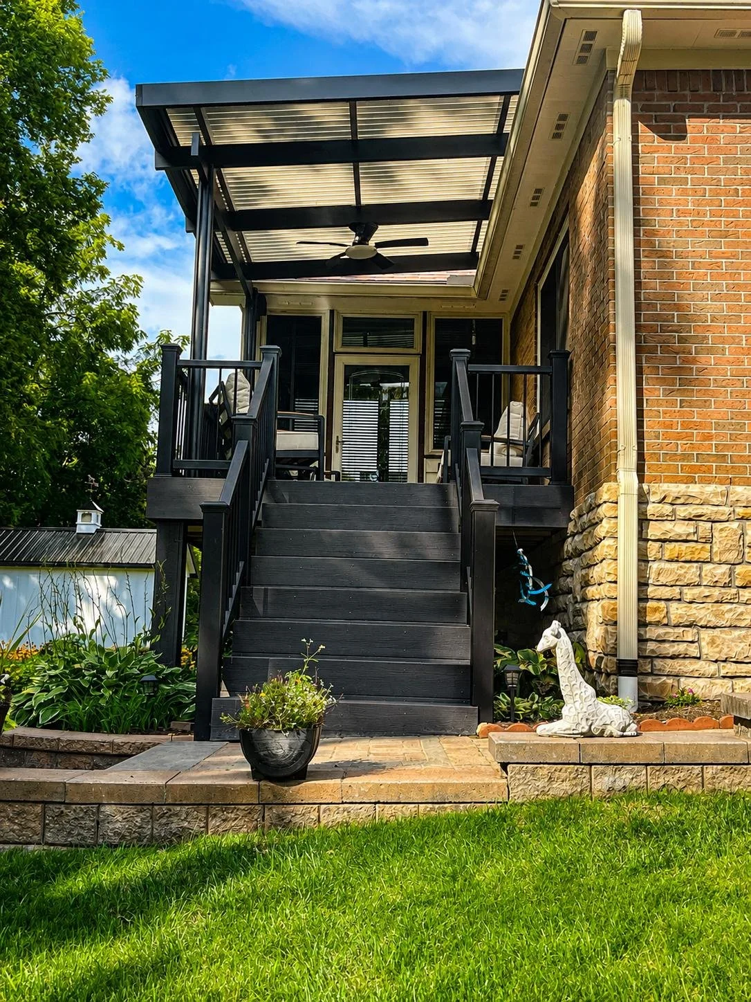 An outdoor space at home after installing Solara Patio Covers