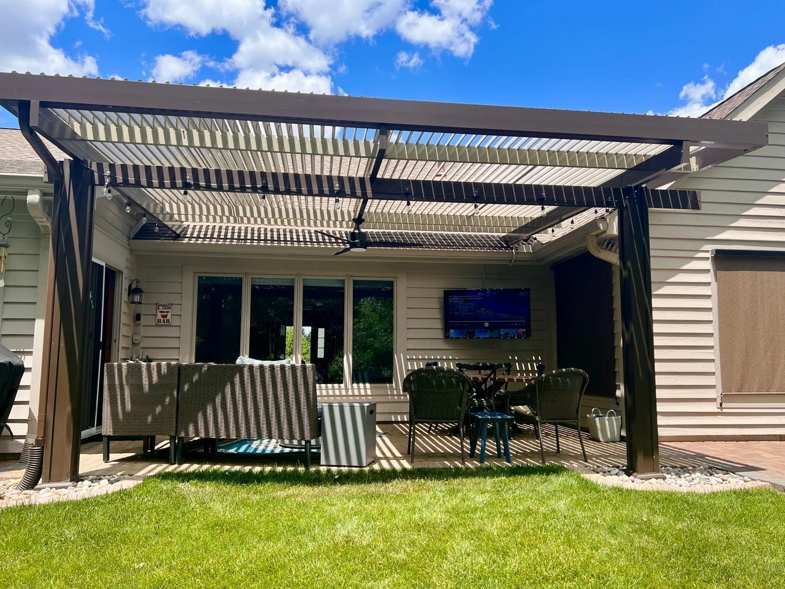 An outdoor space at home post installing Solara Pergola Covers