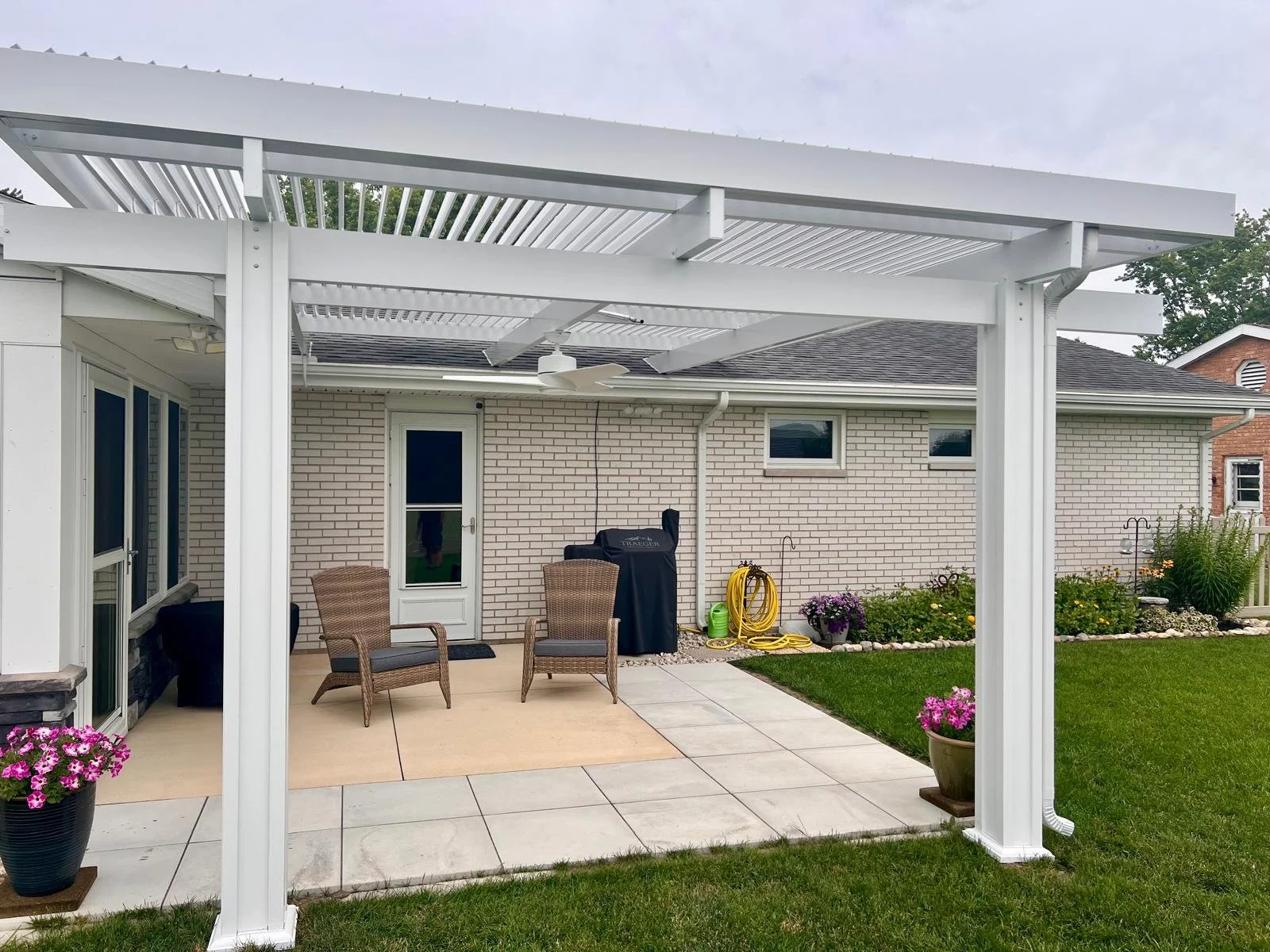 An outdoor space at home post installing Solara Pergola Covers