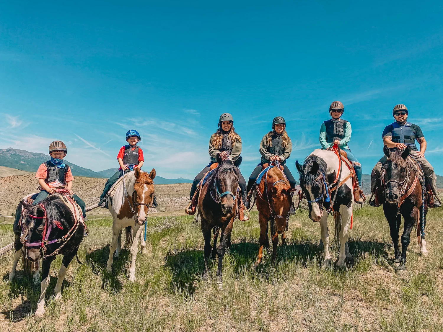 Riders on horseback at the ranch