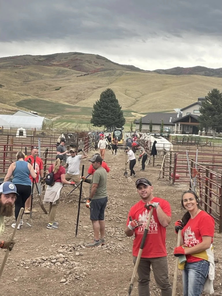 Volunteers building on the ranch