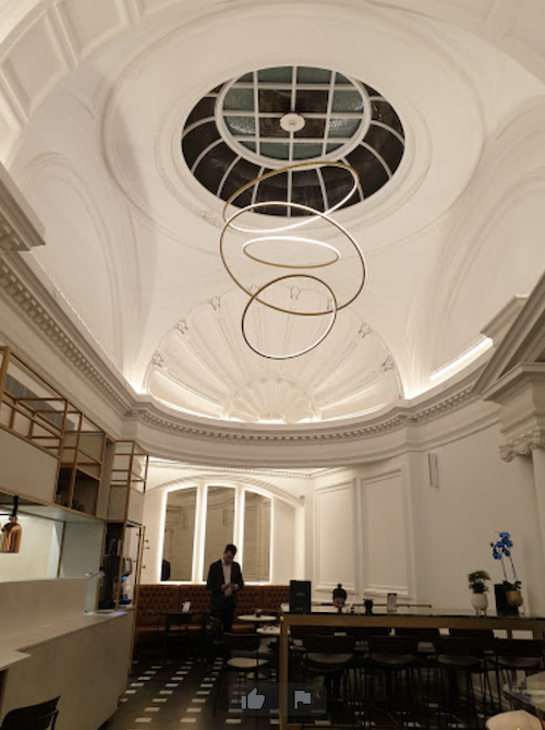 Interior of an elegant, high-ceiling room Z Hotels Hotel lobby central London