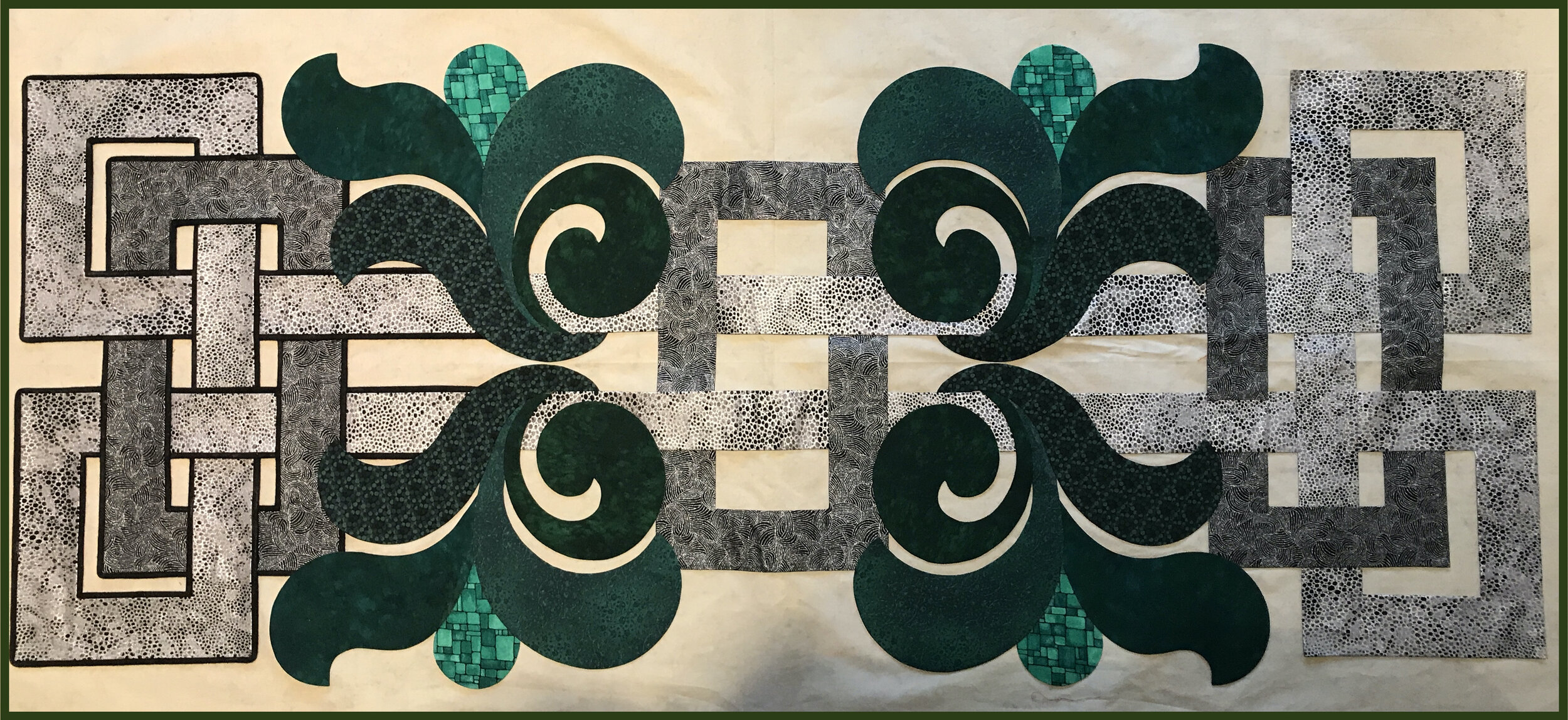 Wow! the black piping around the silver applique on the left really adds depth and interest to the weave