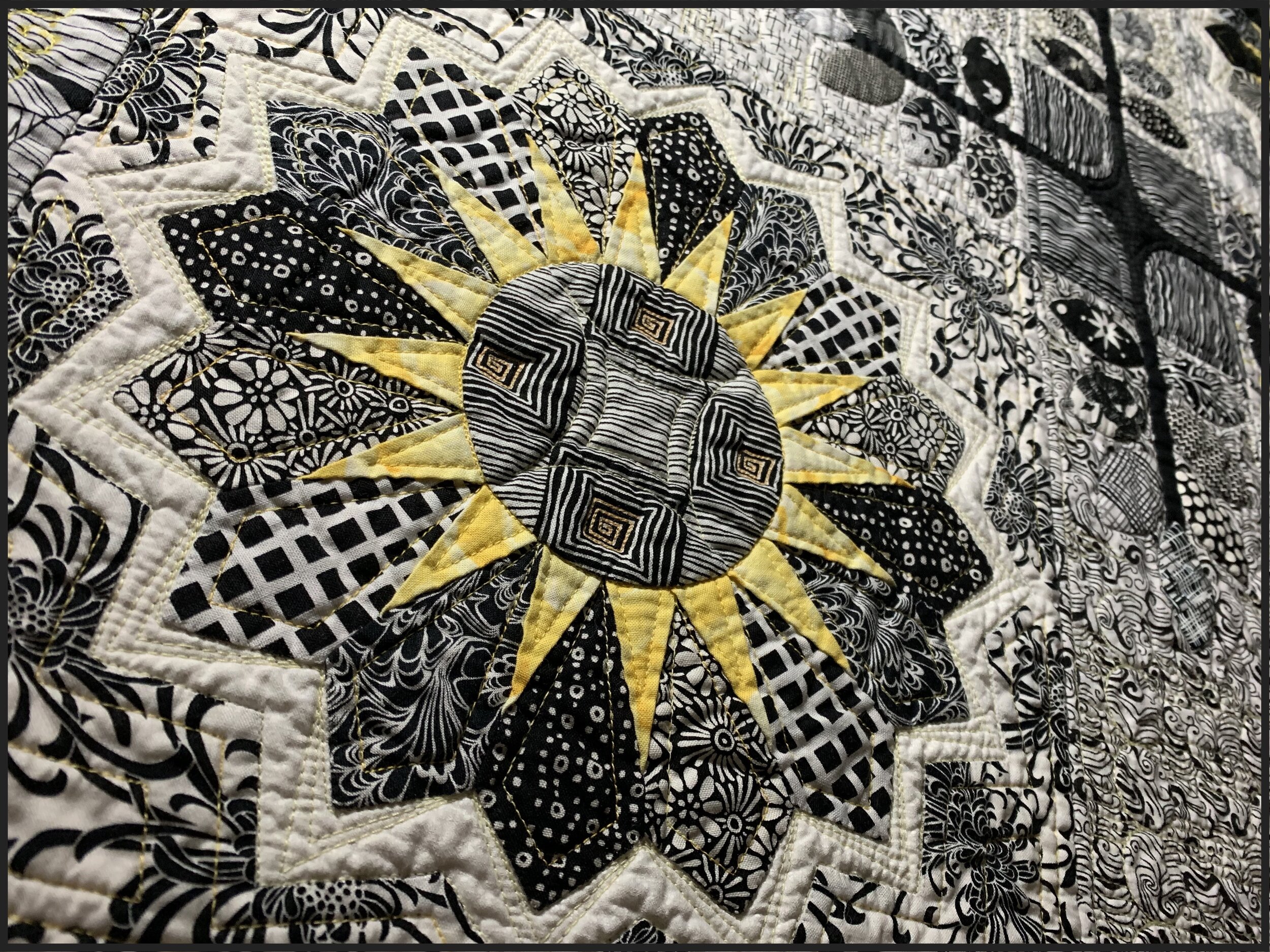 Details of the applique, sunflower piecing, and machine quilting - using a cotton batt that shrinks creating the patina that I love in a quilt