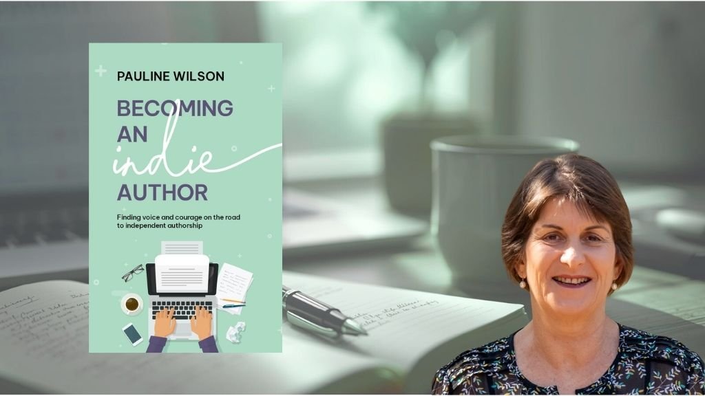 The book becoming an indie author and the author  with writing paraphernalia in the background