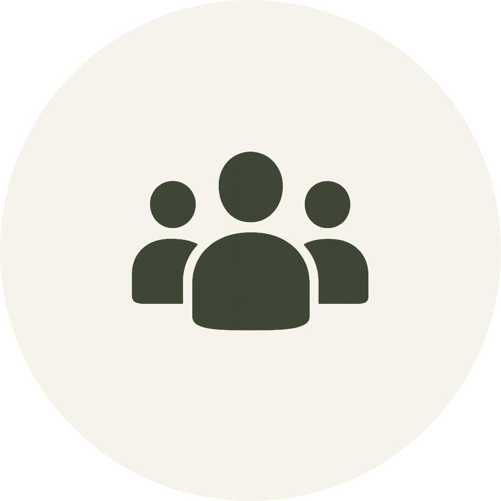 Icon of three people, representing a group or community.