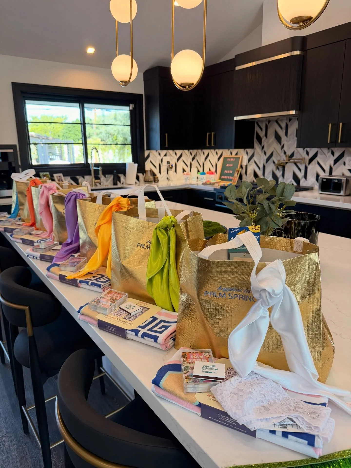 Palm Springs Bach Bags 🌴 
&bull; Custom Playing Cards
&bull; Mod Beach Towels 
&bull; @werkshoppestudio Kaftans (embroidered with initials)
&bull; @vacationinc Sunscreen
&bull; Silk Pool Scarves 
&bull; Advil and @waterboycan 
&bull; Custom Matches 