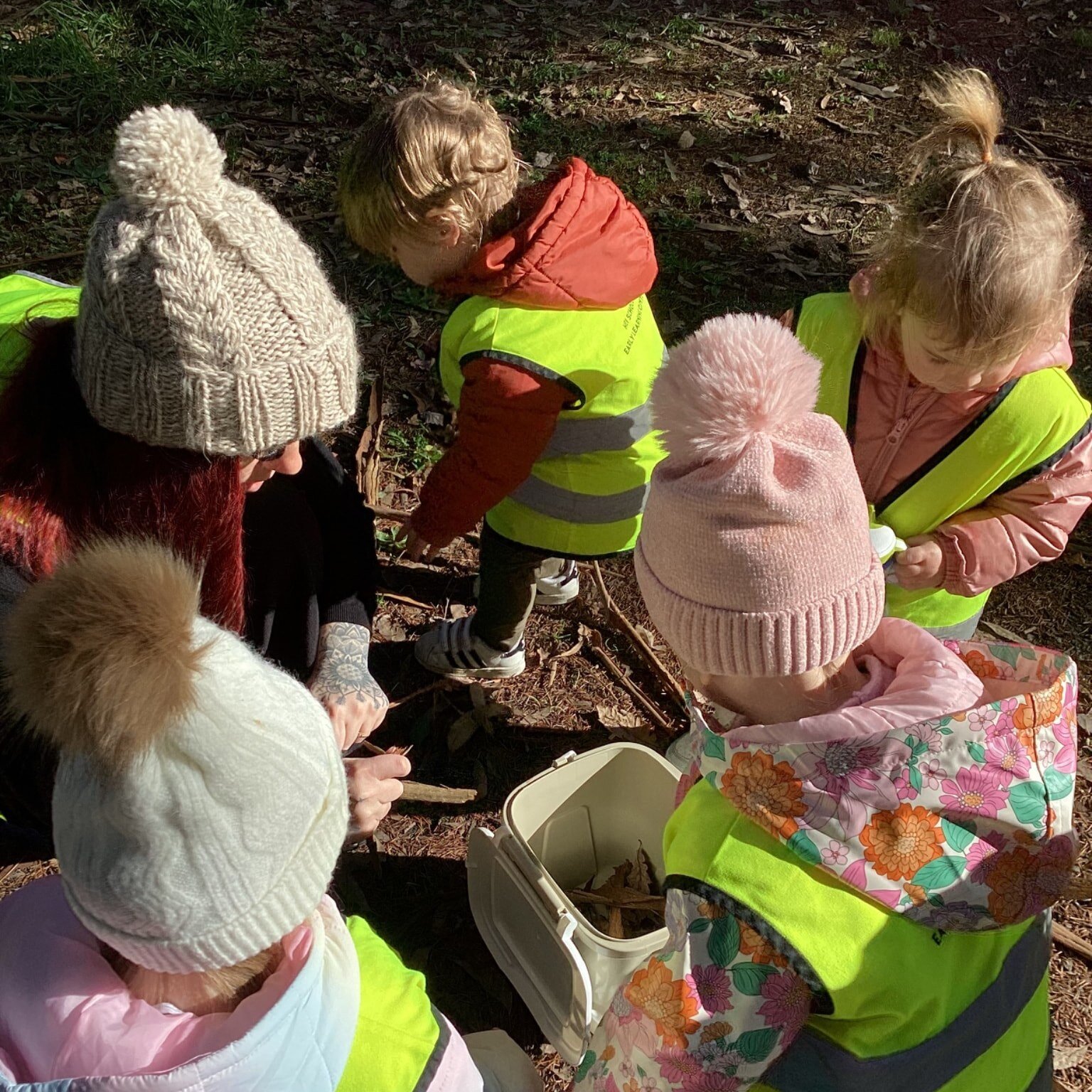 Exploring local environments encourages children to connect with their community and develop their gross-motor skills through the rough terrain.
