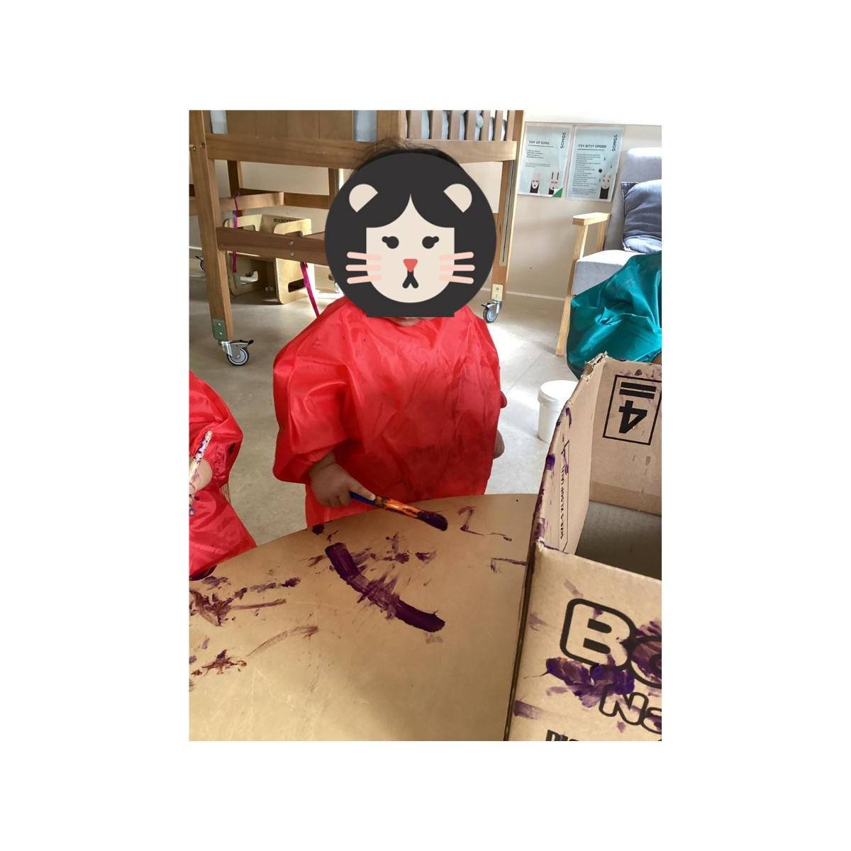 Bright babies are exploring with car painting on cardboard boxes today! 🎨 Not only are they discovering colours and textures, but they're also building their fine motor skills as they grasp and play with brushes. 

#babiesroom #brightbabies #HEI #he