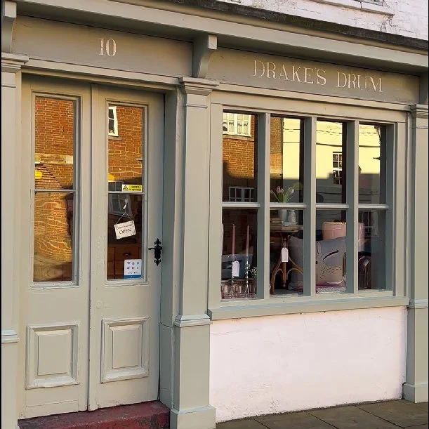 Front of a shop window called Drakes Drum