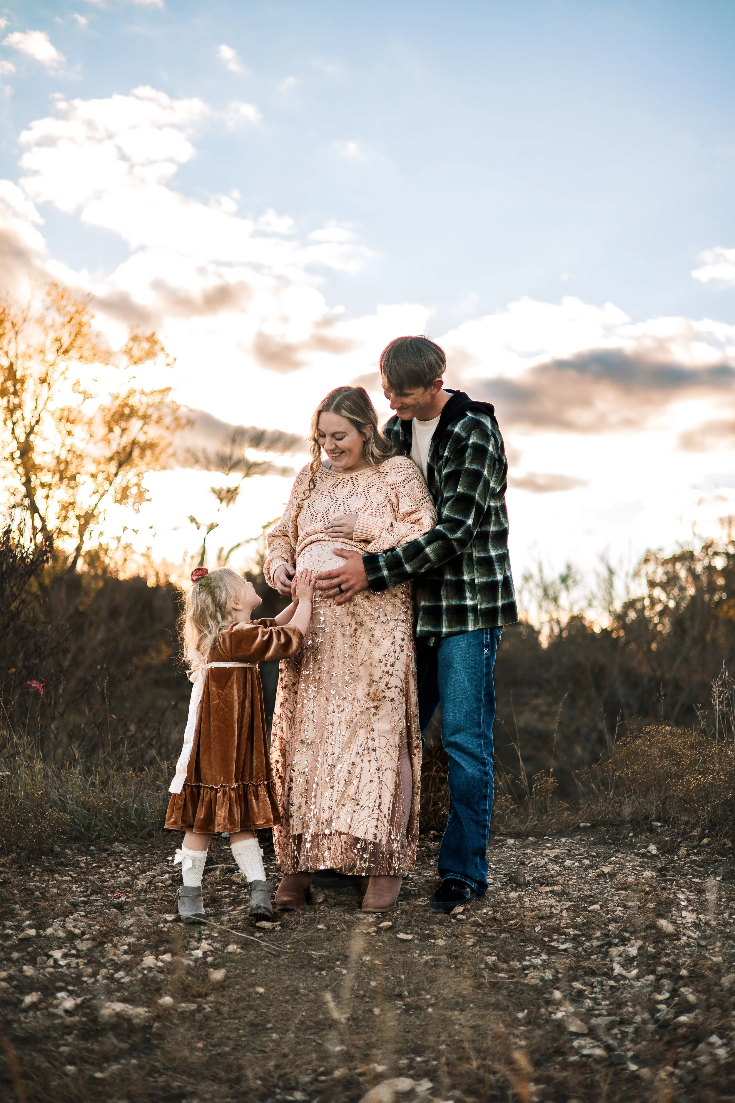 Golden hour family portrait at the end of a relaxed family photo session in Kearney, Nebraska