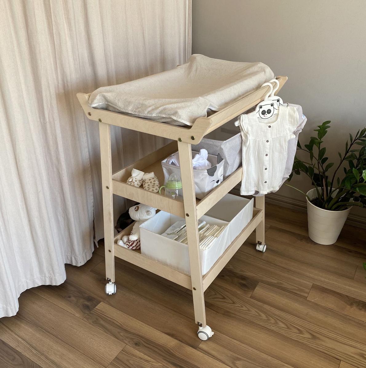 -- Natural Changing Table -- Love this changing table. Get the 34X21 size so that you can fit a Keekaroo on the top of it. On the sides of the Keekaroo you can keep your most used lotions, wipes, etc. There's lots of great room underneath as well for