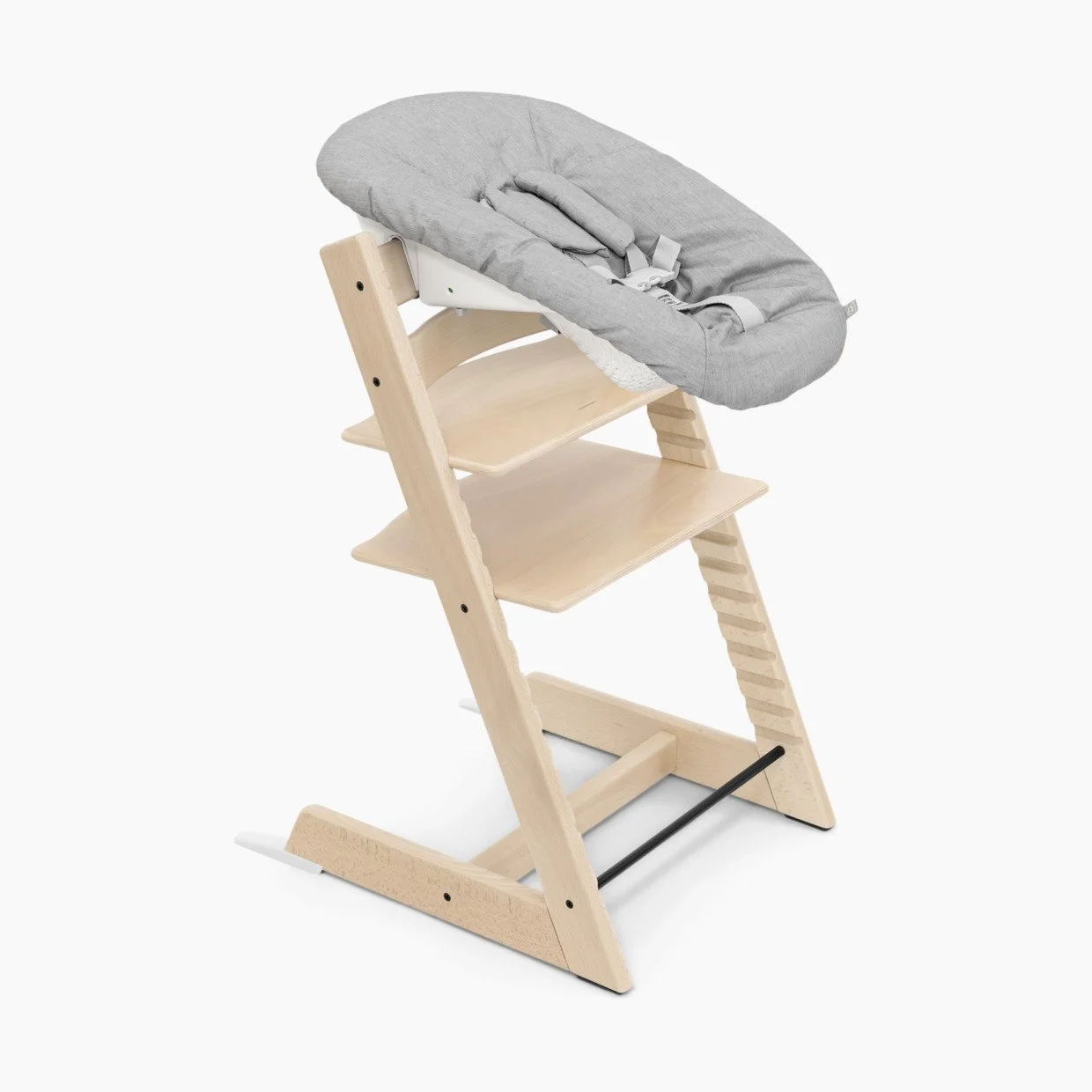 -- Stokke Newborn Seat -- Great for the first handful of months before they can sit up on their own. We had this at the table with us while we ate or in the kitchen while we cooked.