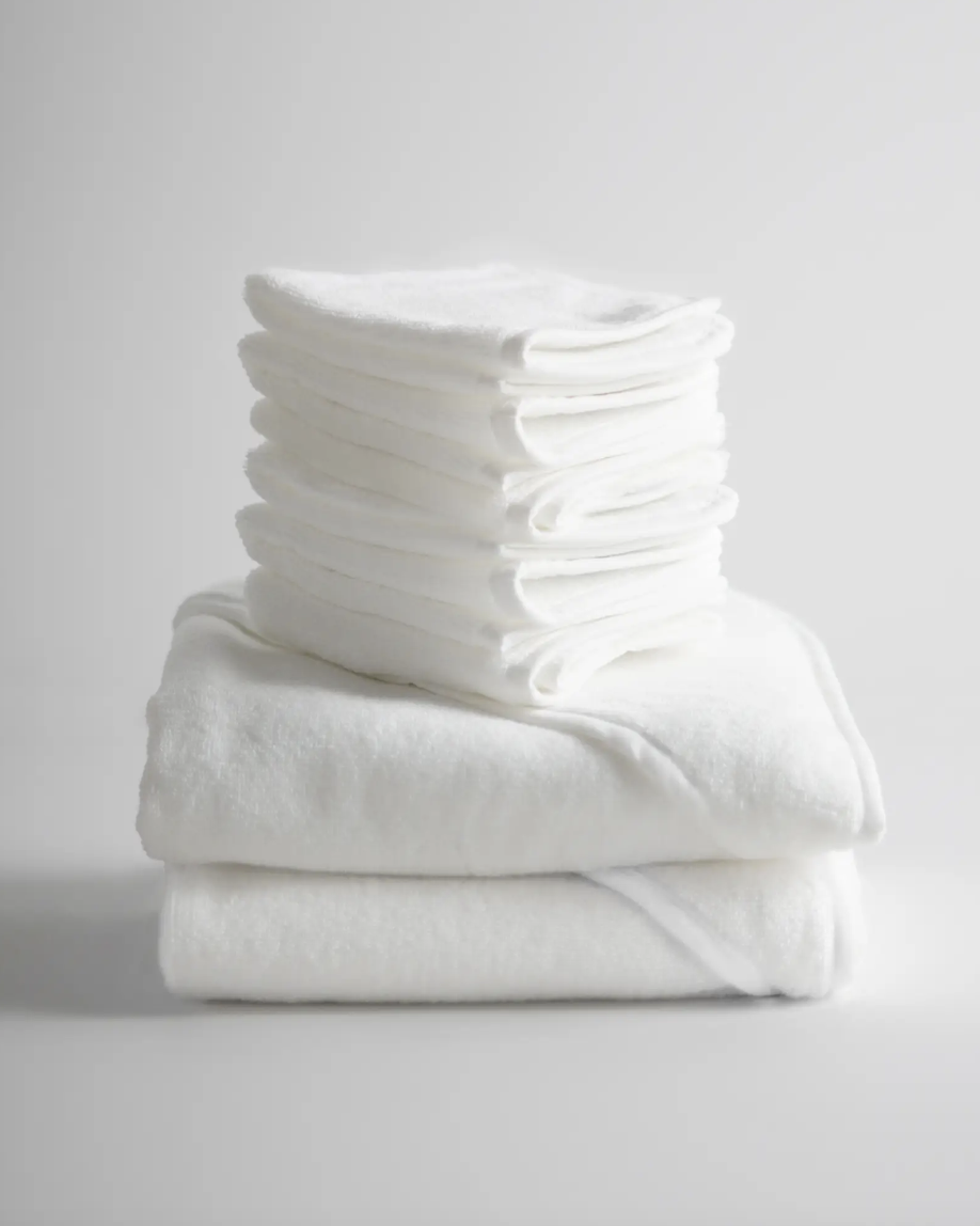 -- Quince Baby Towels -- Don't get anything fancier than this. They will get dirty and stained. 