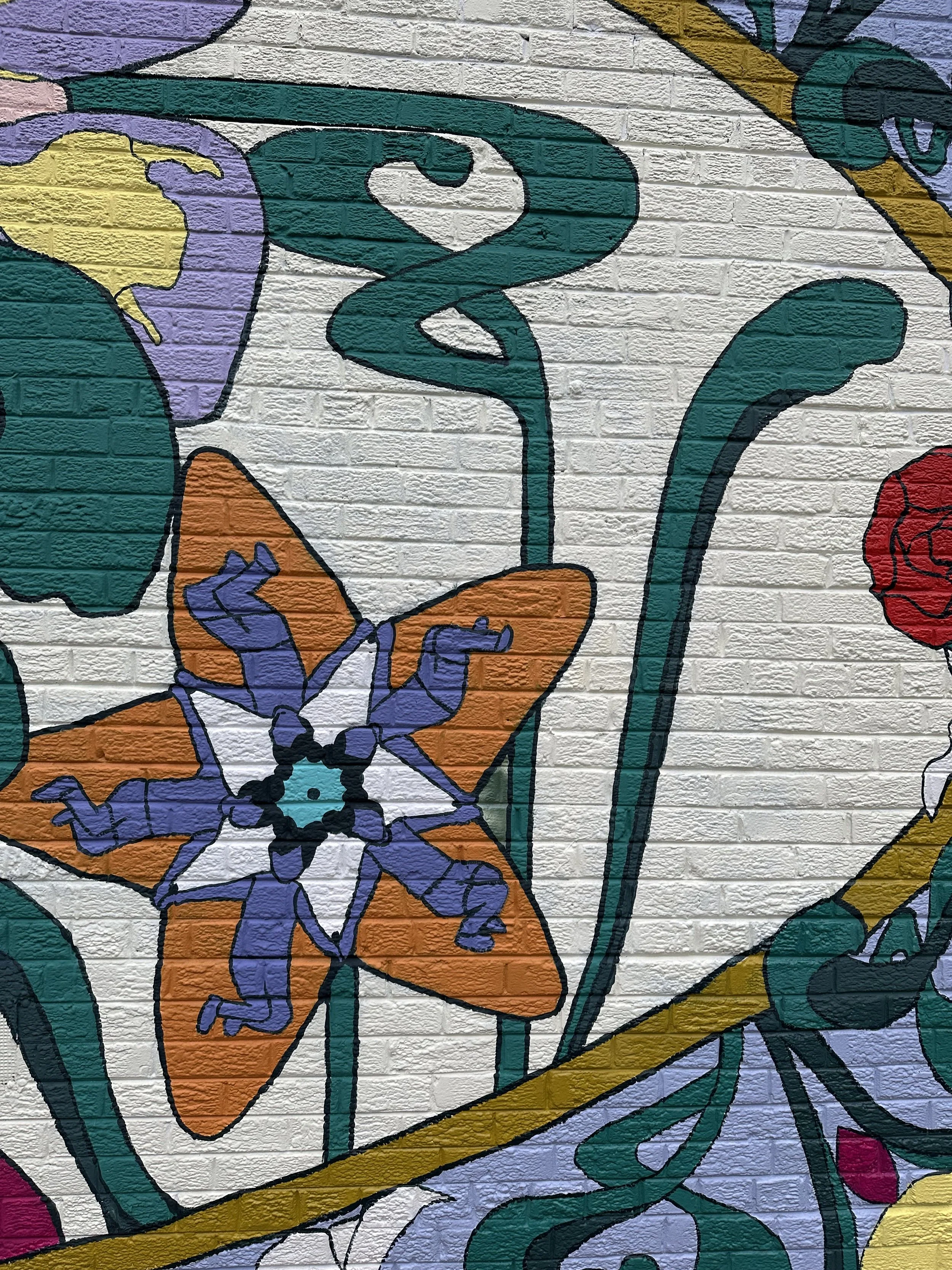 “And Yet We Bloom”, mural commissioned by NOMABid at Stable Arts DC, 2025.