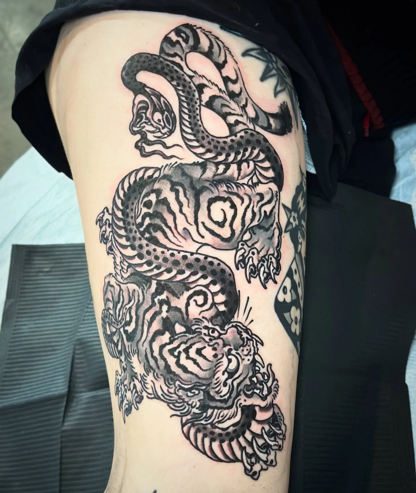 Tiger vs. Snake thank you Claudia ✌️✌️ @tattoosmilepdx