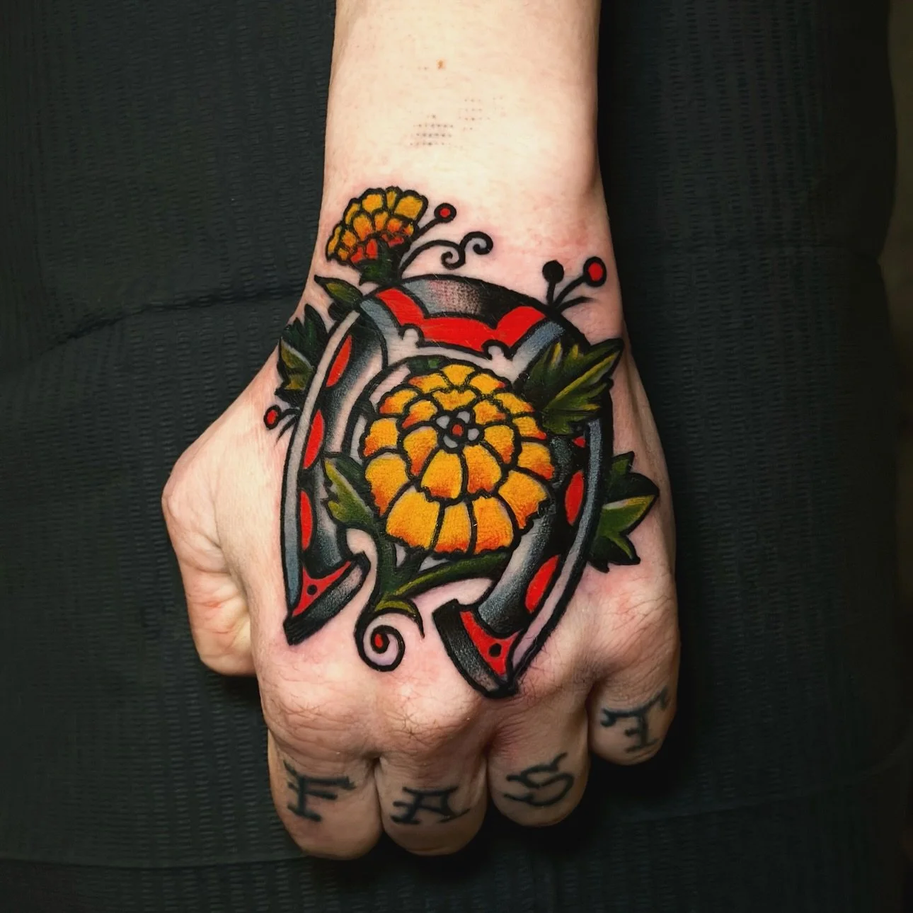 Marigold &amp; Horseshoe to signify Dion&rsquo;s new transition in life. Thanks for letting me do this one. @tattoosmilepdx