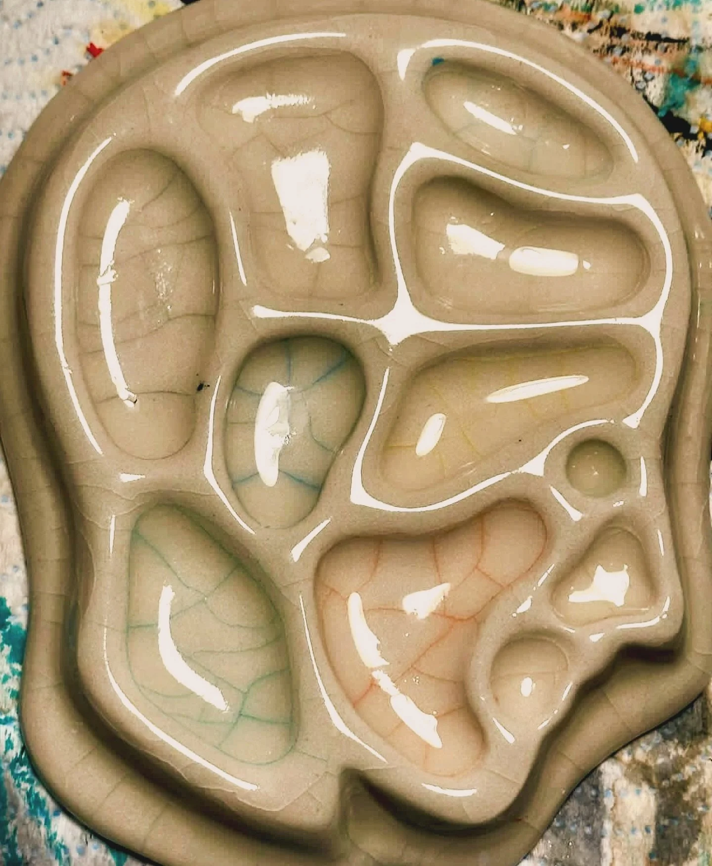 I used a crackle clear on this last run of paint pallettes so when you paint it&rsquo;ll stain each well with pigment &mdash; we in show business call this an Easter egg 🥚