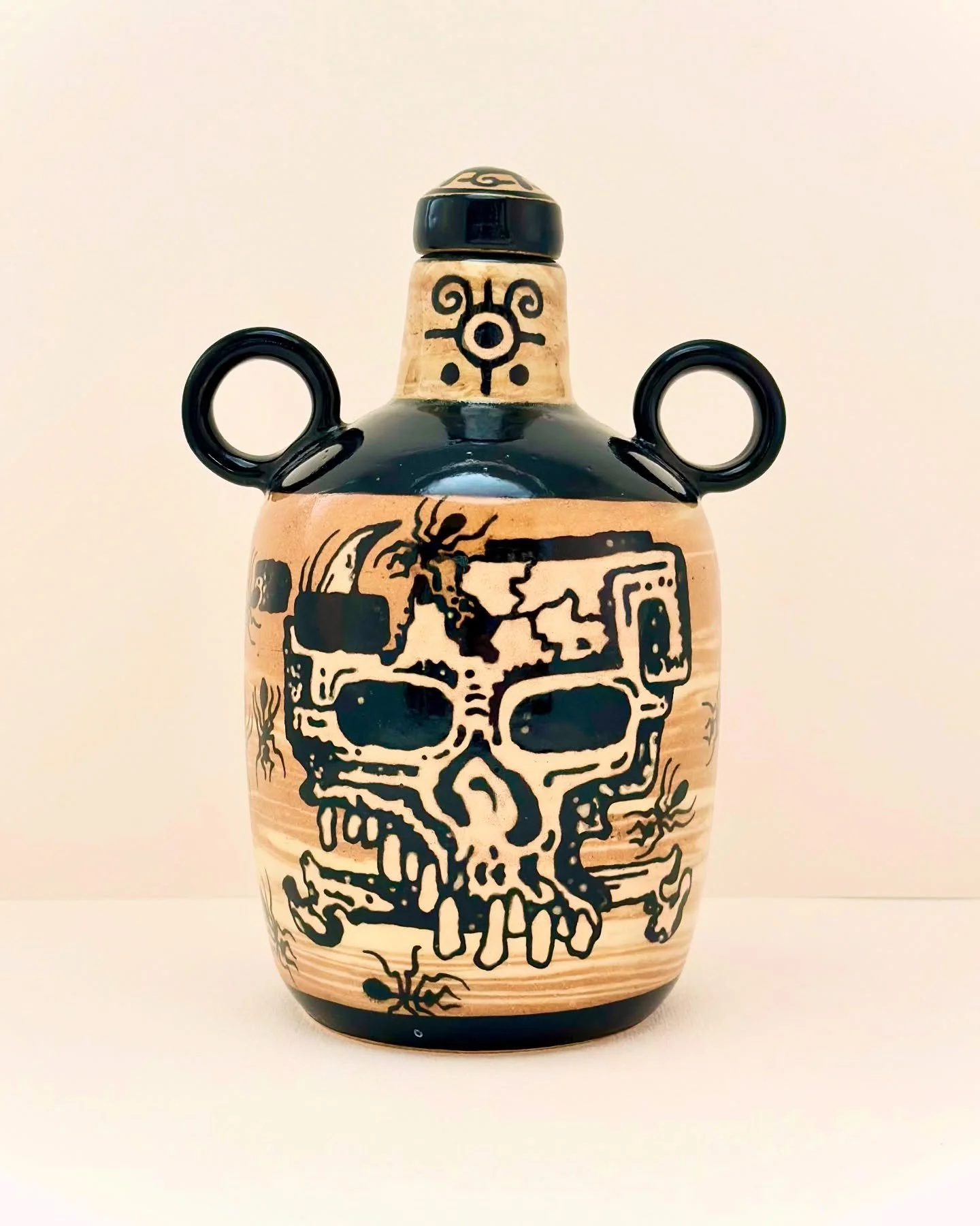 Liquor Bottle 🐜🐜 Made of two different color clay body&rsquo;s that I cut thin, stacked, and threw on the wheel as a closed form bottle. 
Thanks for looking 👁️👁️
