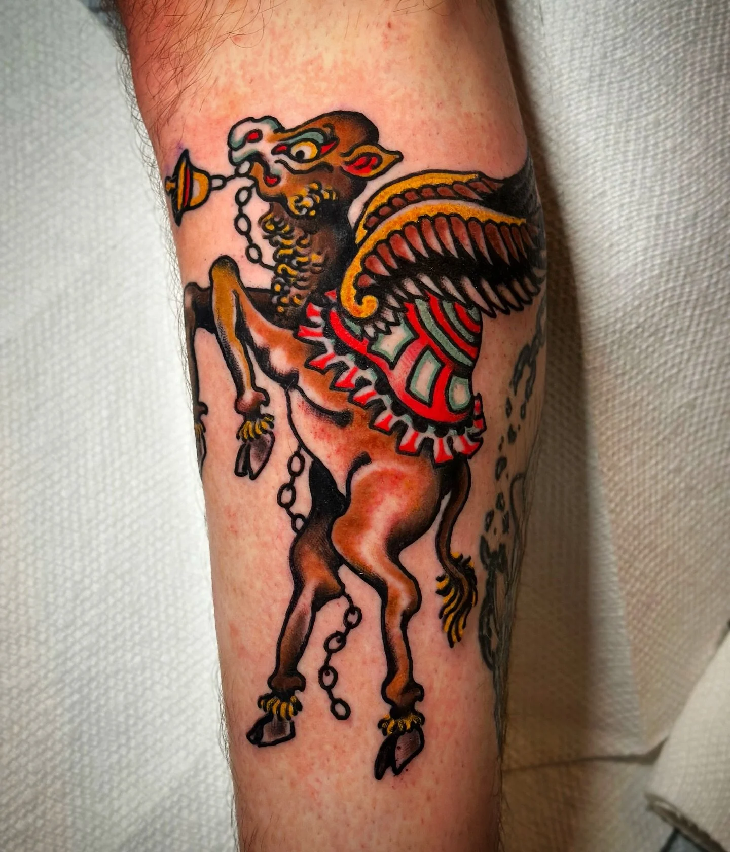 Today I tattooed a flying camel ringing a bell at @tattoosmilepdx