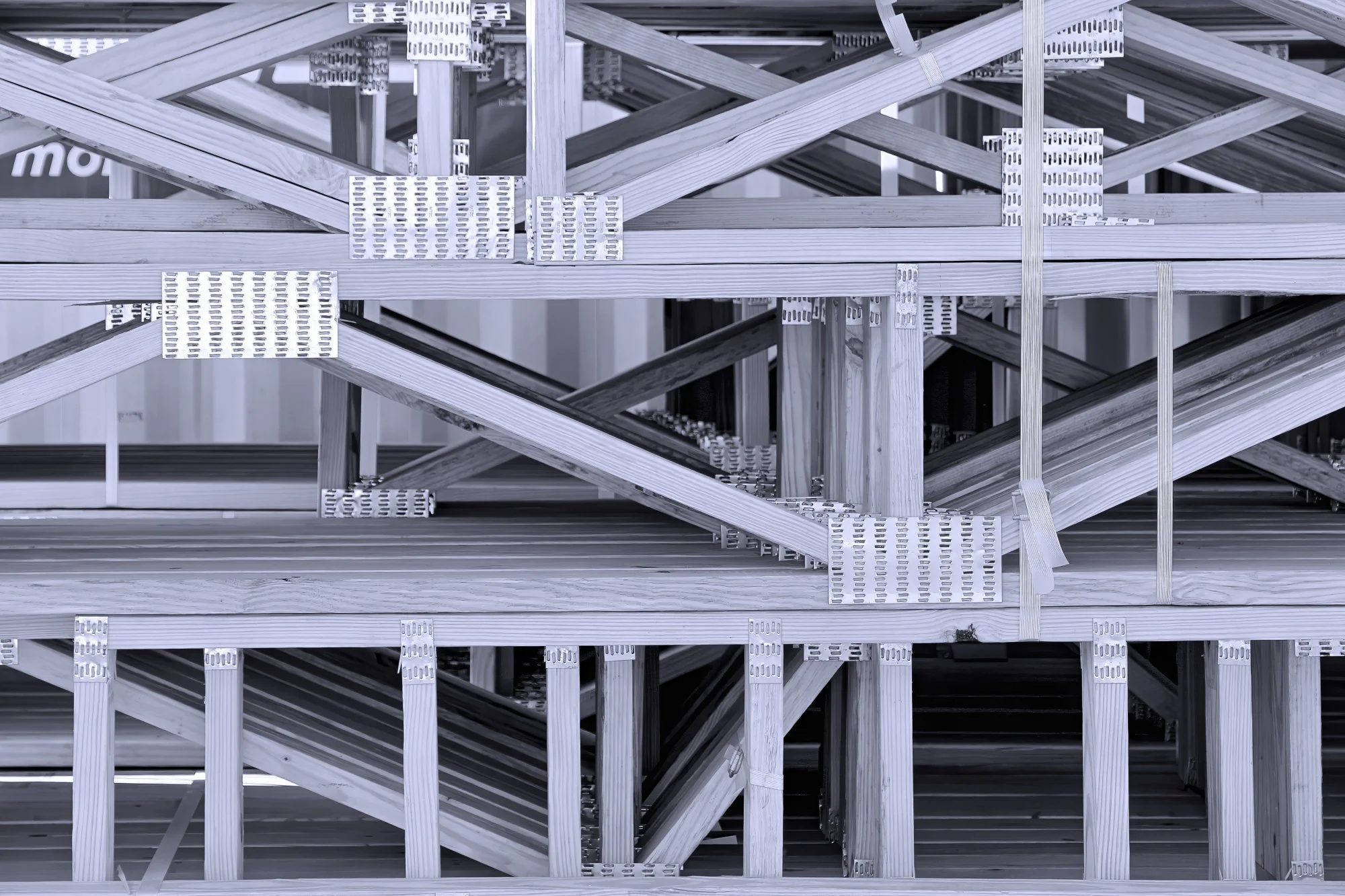 211118.B.09.N.01 - Bundled Pre-Engineer Wood Floor Trusses Stored on a Construction Site