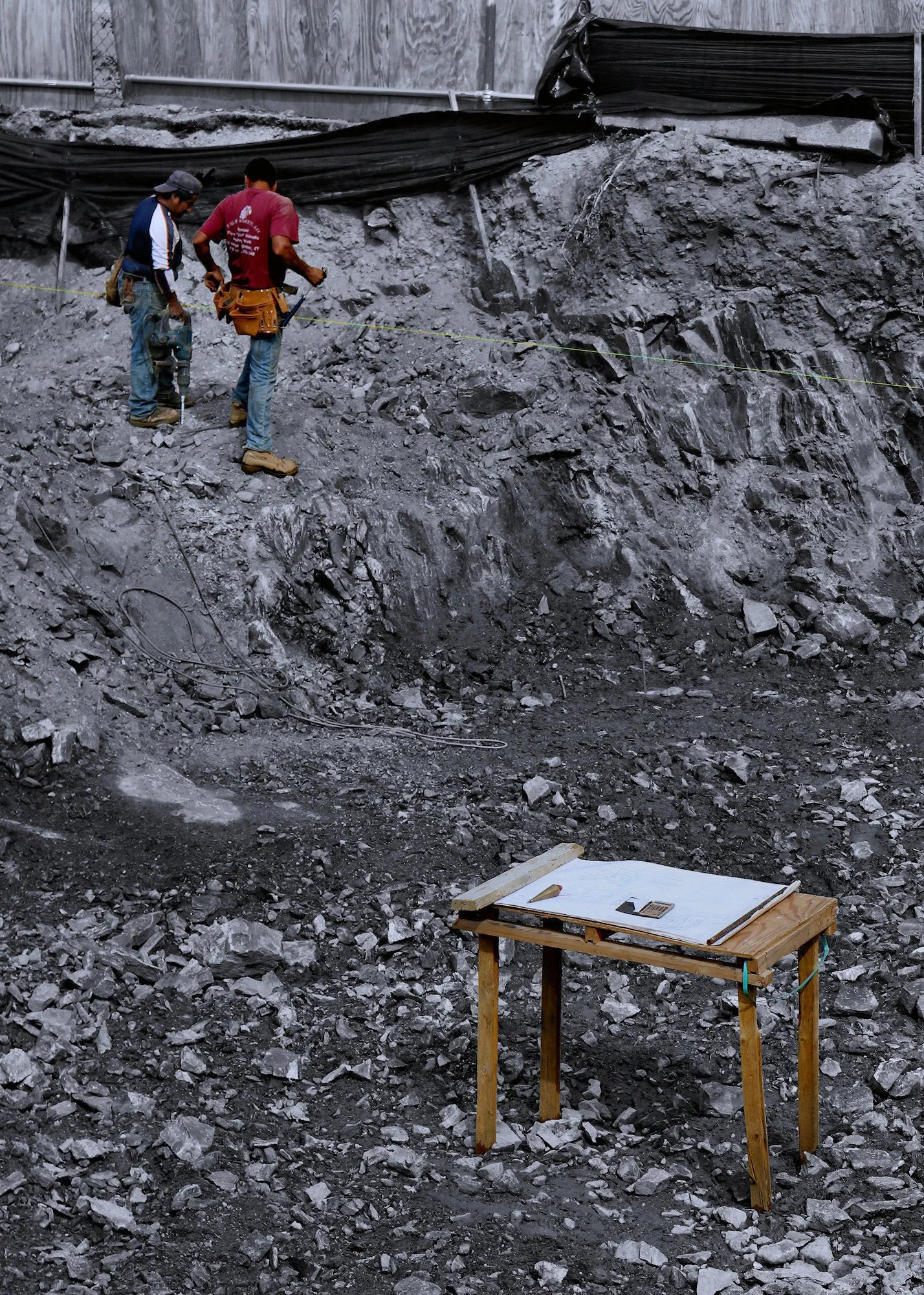 160926.A.03.Y.01 - Plan Desk in an Excavated Pit for Layout of a New Building's Foundation.