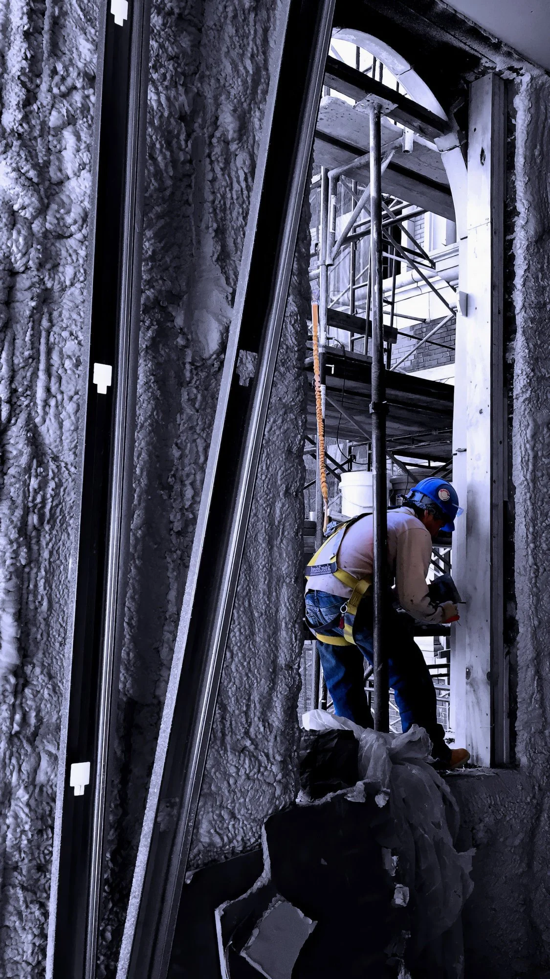 Construction Worker Installing Wood Blocking