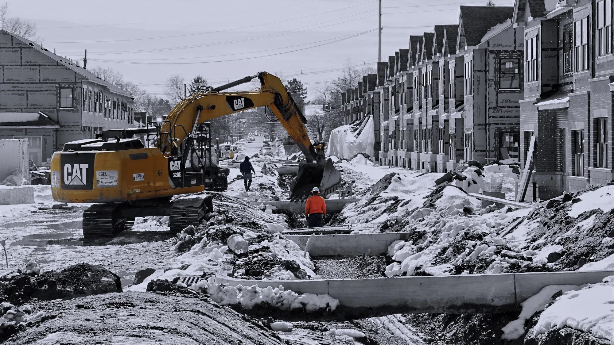 site construction winter trench excavator
