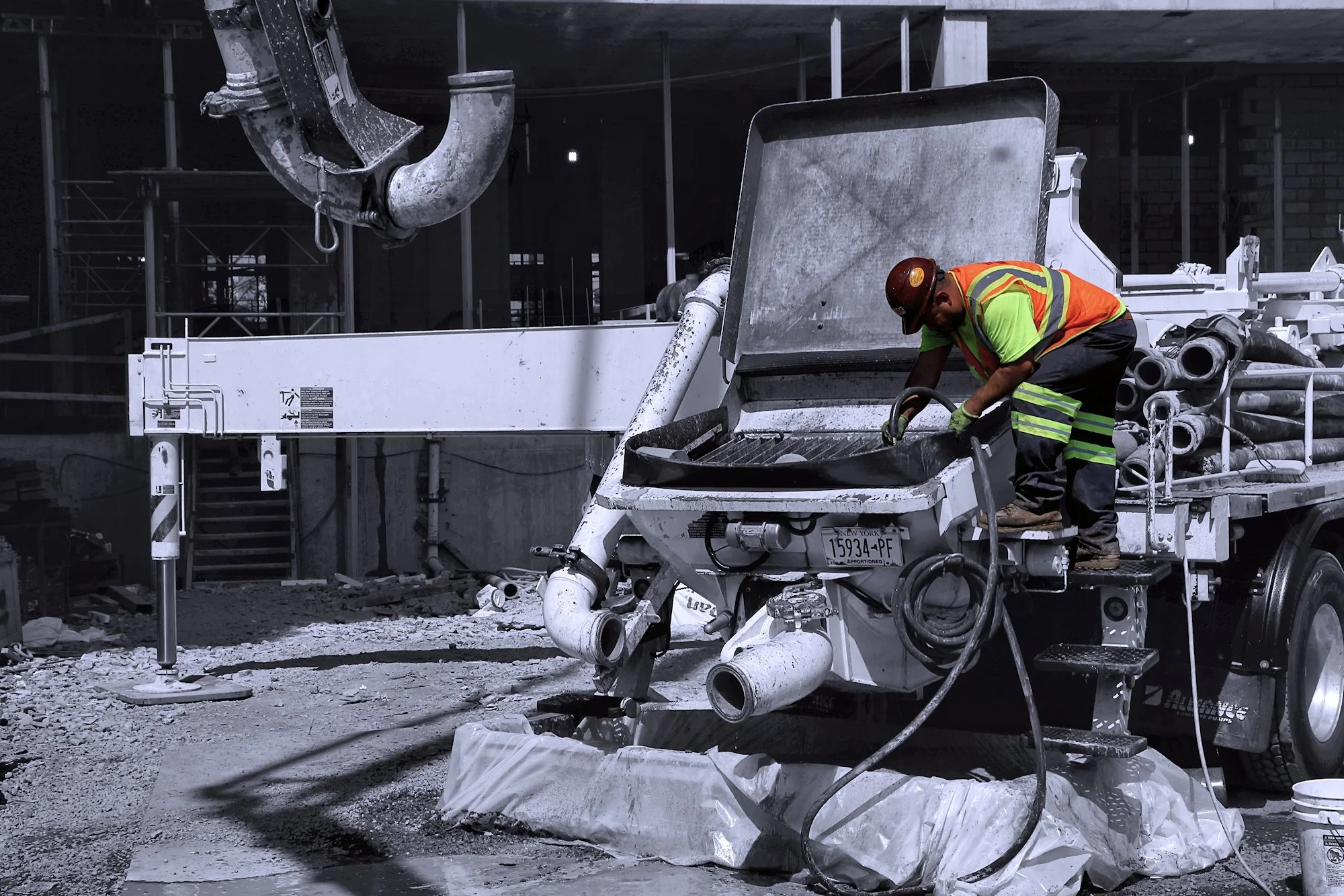 Cleaning Concrete Pump Truck Hopper Construction