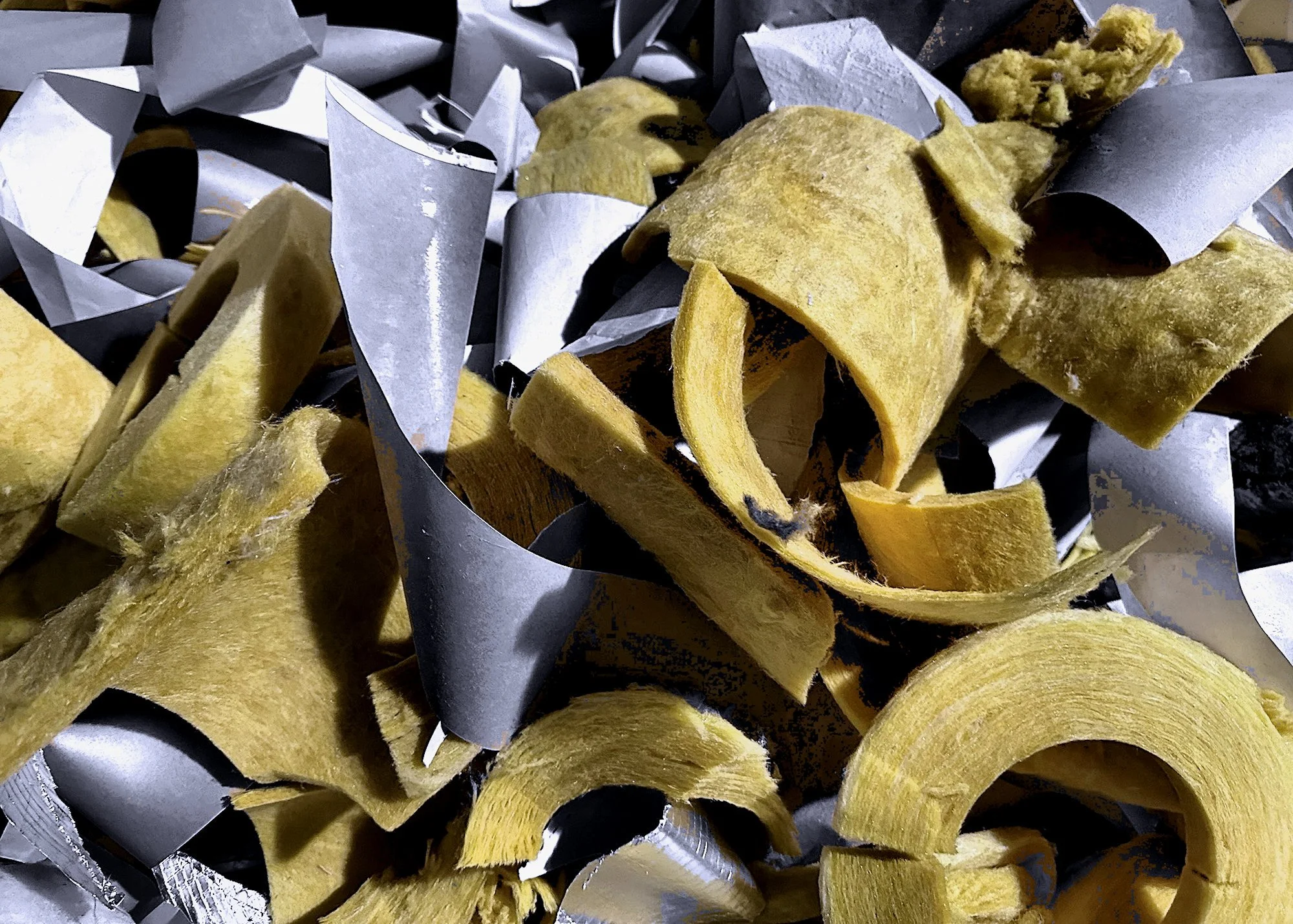 231021.A.03.N.01 - Pile of Scraps from Pipe Insulating 