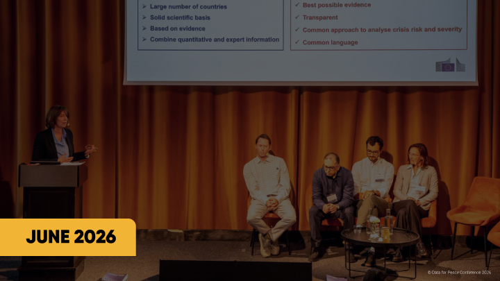 Panel discussion at the Data for Peace Conference 2026, with a speaker at a podium and four panelists seated on stage.