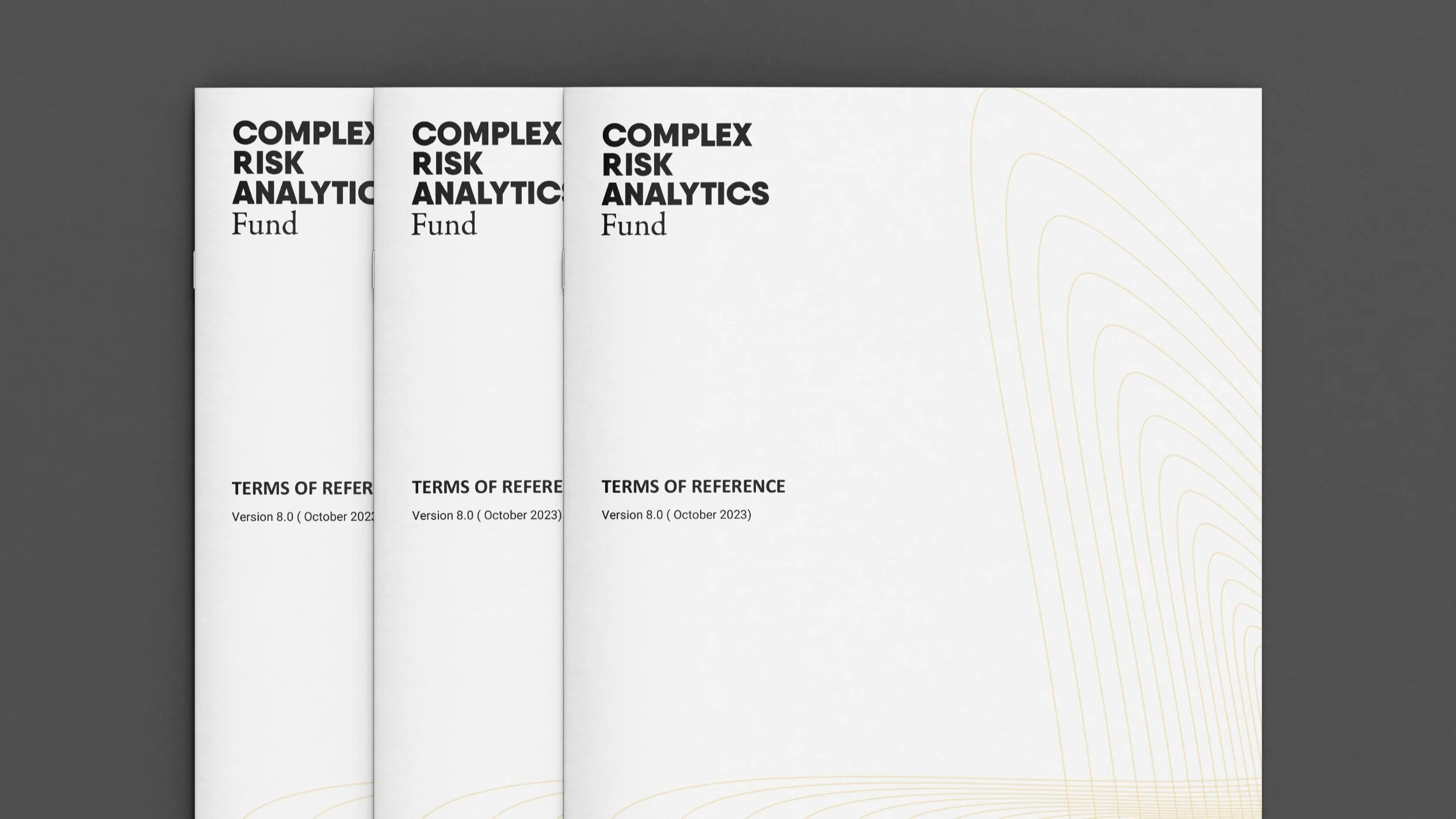 Three white documents titled 'Complex Risk Analytics Fund', with 'Terms of Reference Version 8.0 October 2023' printed below, laid side by side on a gray surface.