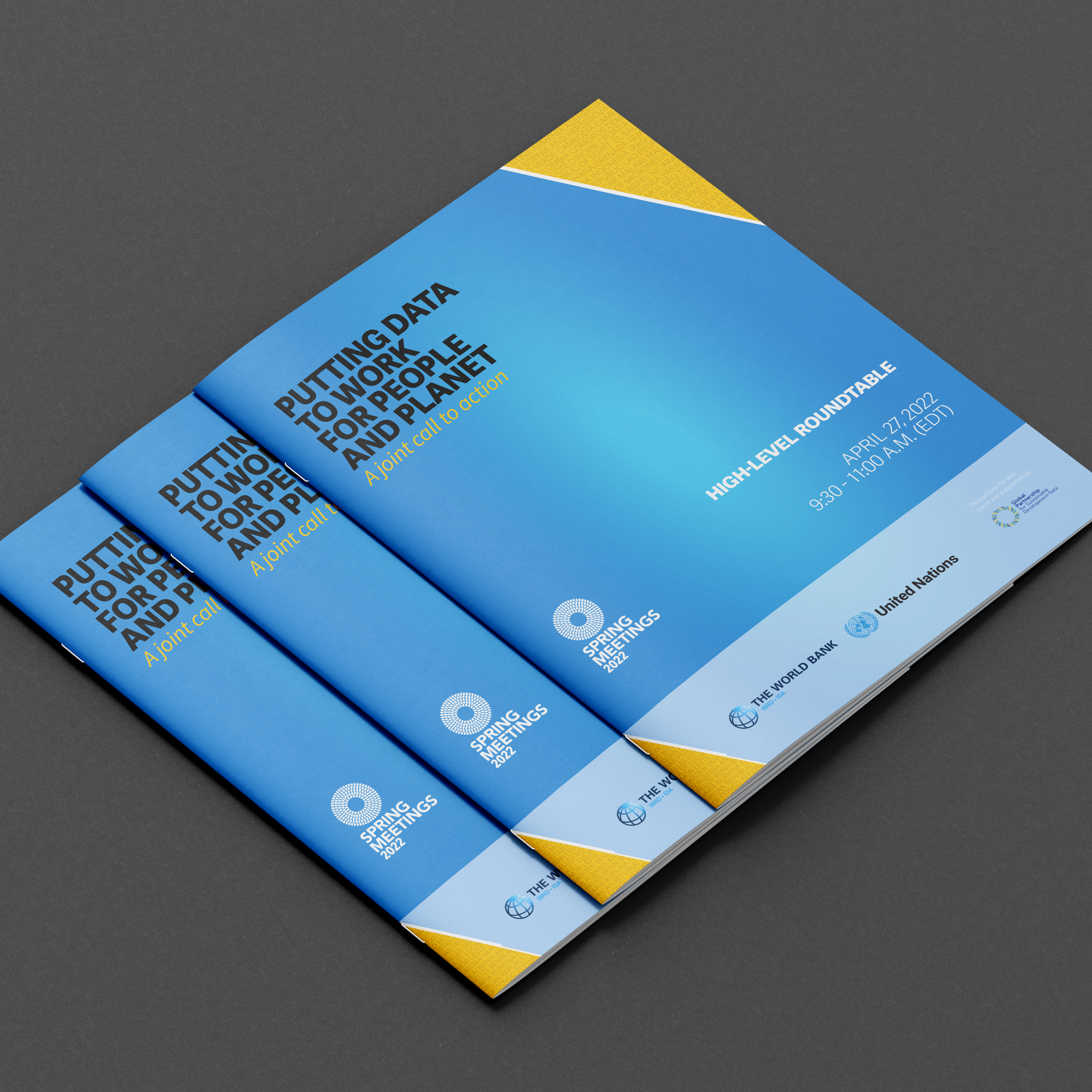 Three blue flyers for the Spring Meetings 2022, titled "Putting Data to Work for People and Planet," with details about the high-level roundtable on April 27, 2022, from 9:30 to 11:00 A.M. EDT, and logos of the World Bank, United Nations, and other organizations at the bottom.
