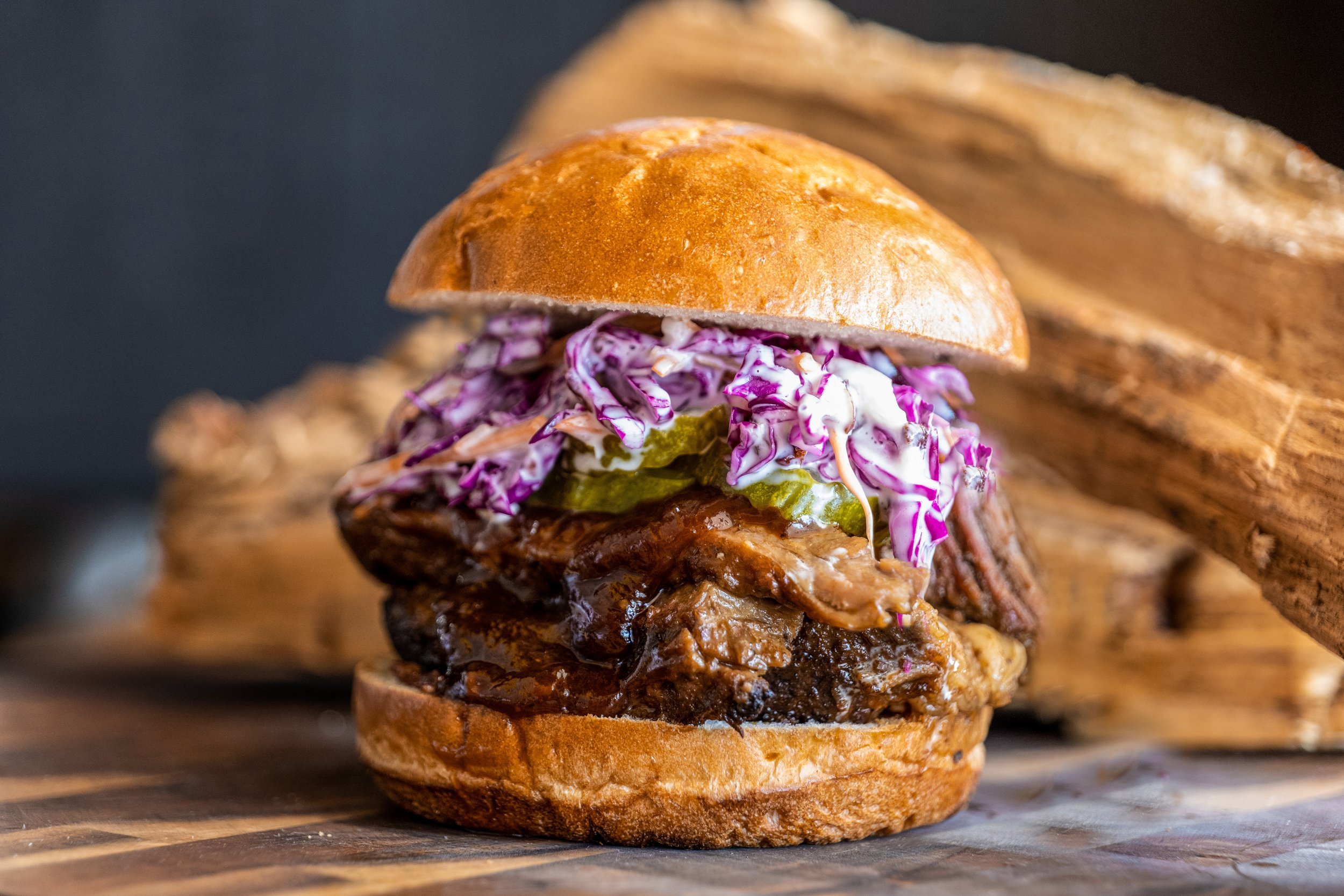 Classic brisket burger with house slaw and bbq sauce for lunch catering in gilbert