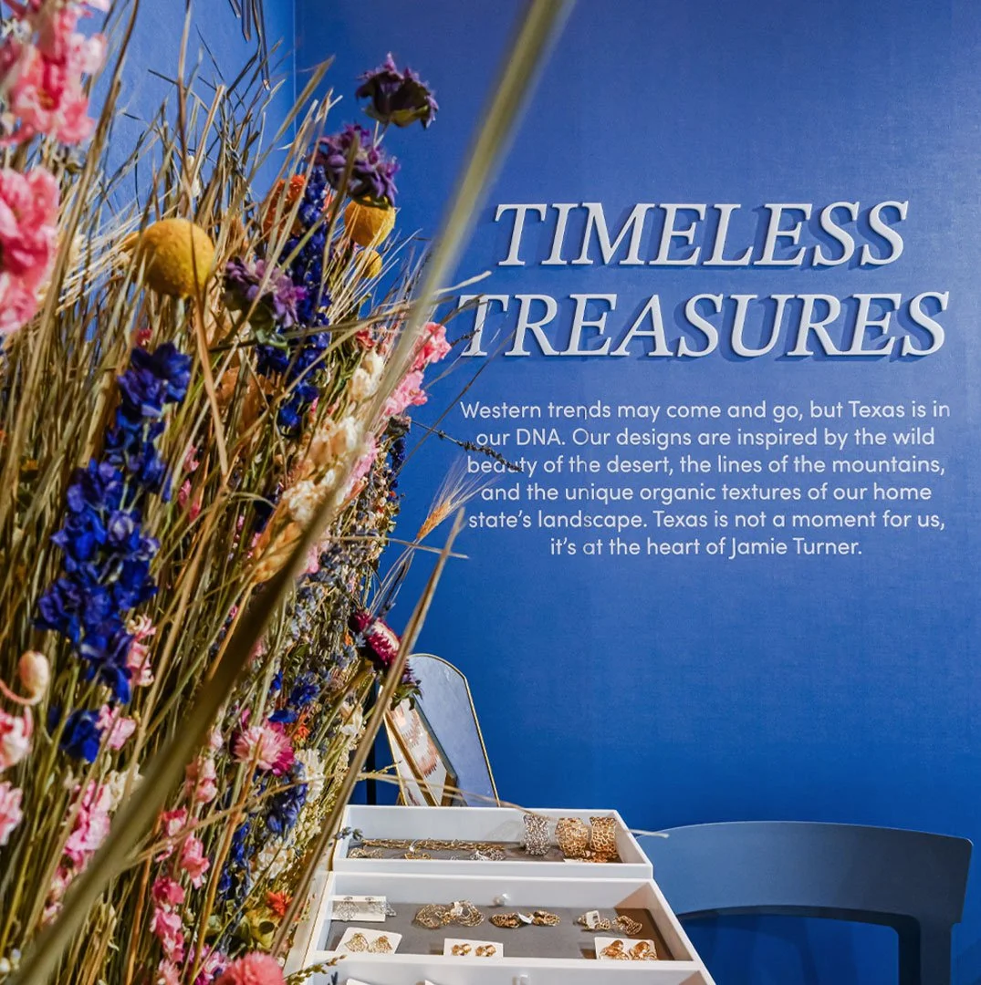 #TeamMowax is thrilled to showcase the stunning debut of @jamieturnerdesigns at the Couture Show. This custom booth brings the beauty of the Texas landscape to life with wildflowers and gold accents&mdash;perfectly complementing the brand's handcraft