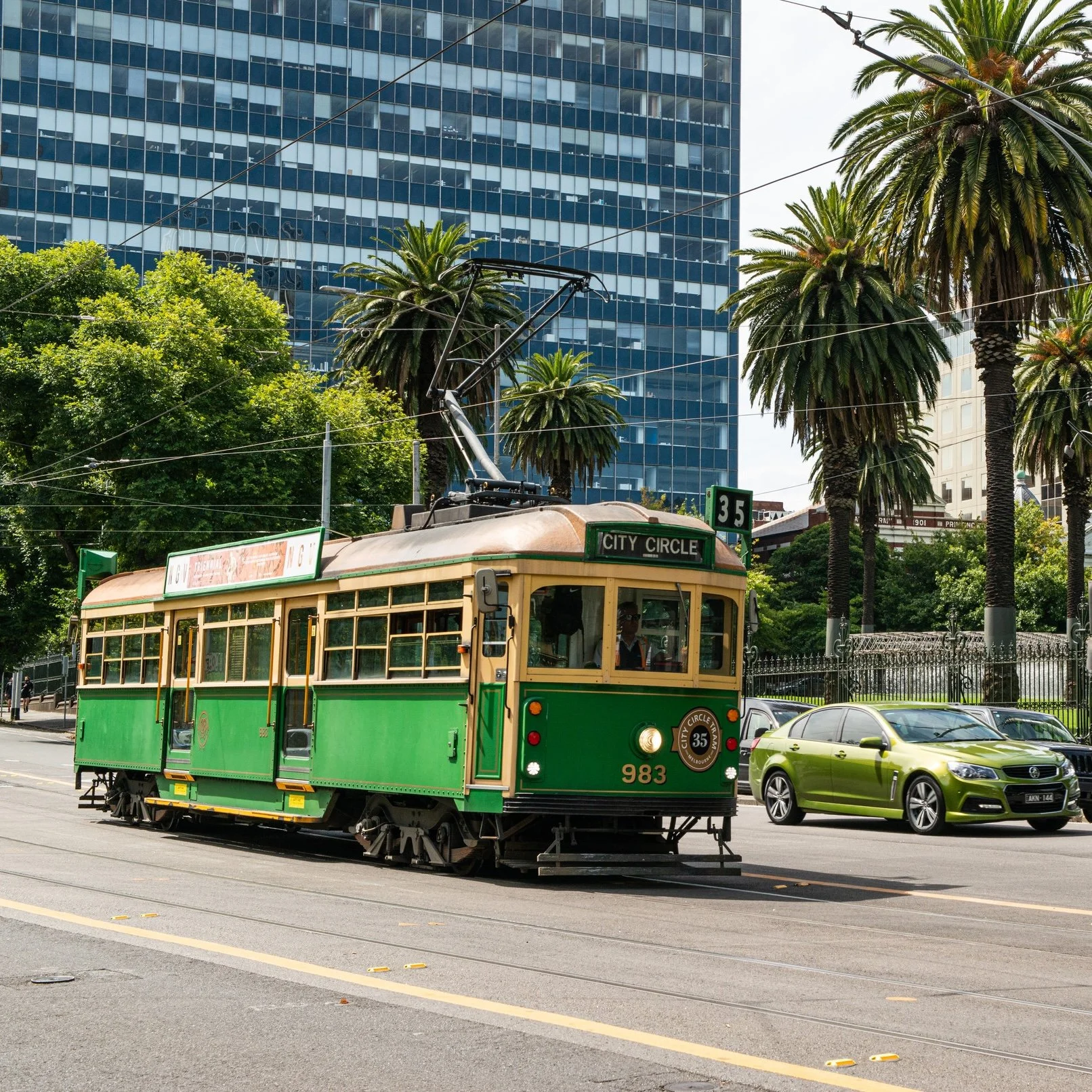 Aerial view of the iconic XXXX Brewery in Milton, Brisbane. The large red-brick industrial building features the “Milton Brewery” signage, a cartoon character holding a beer, and prominent XXXX branding on the rooftop and beer tanks.