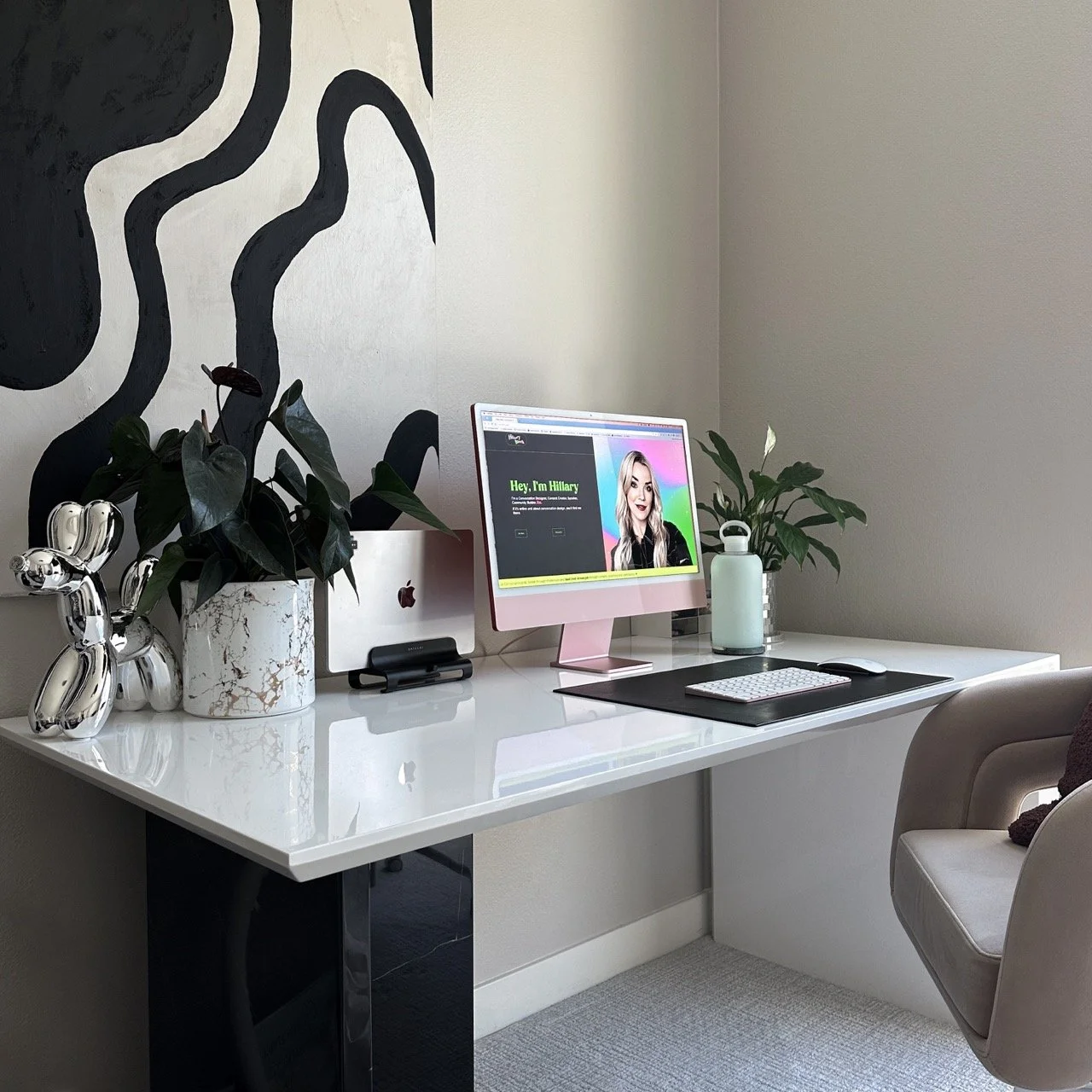 web-design-studio-pink-imac-client-website-on-screen
